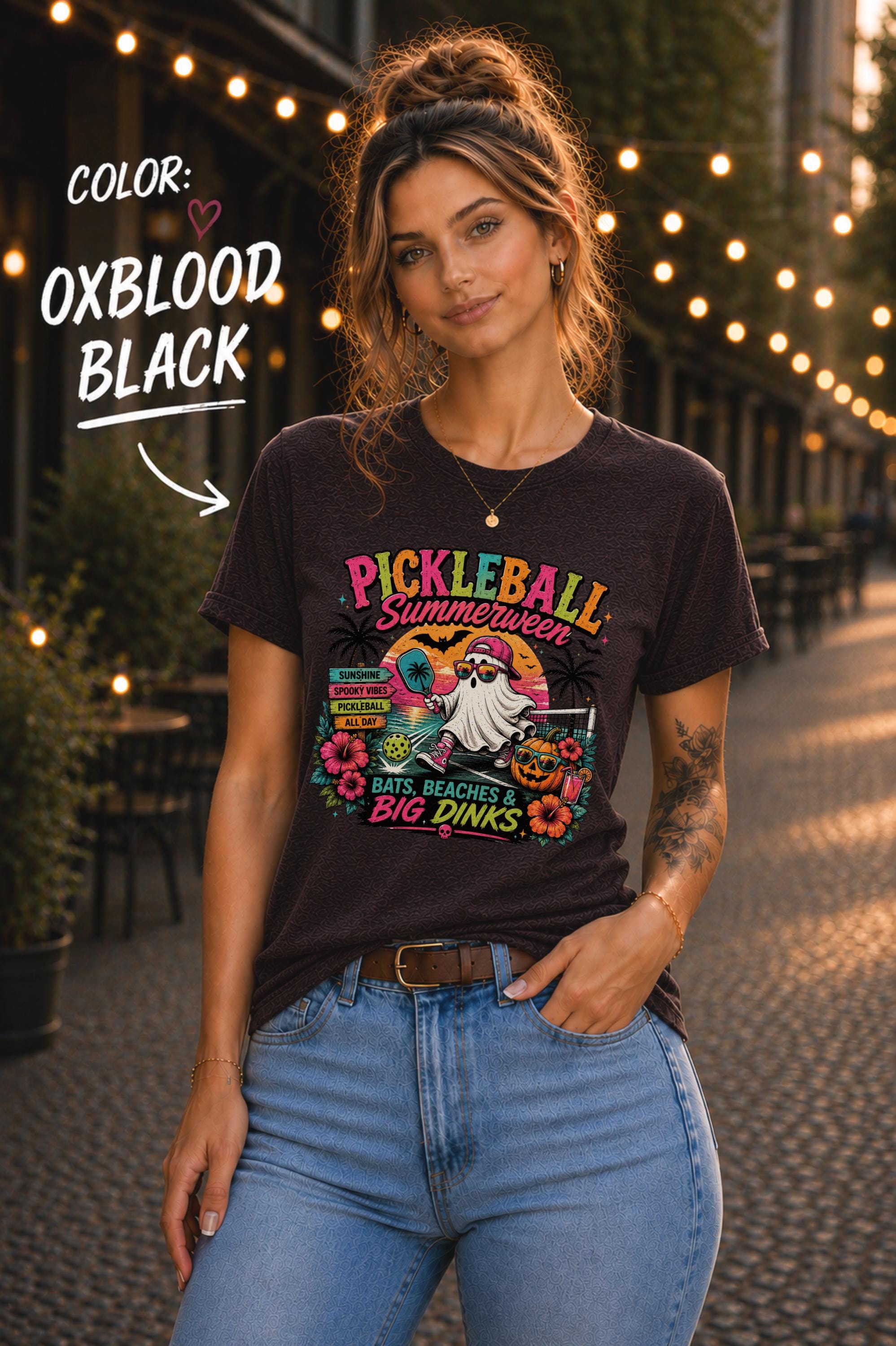 Spooky tropical pickleball graphic tee featuring ghost character, hibiscus flowers, pumpkins, and pickleball paddle.
