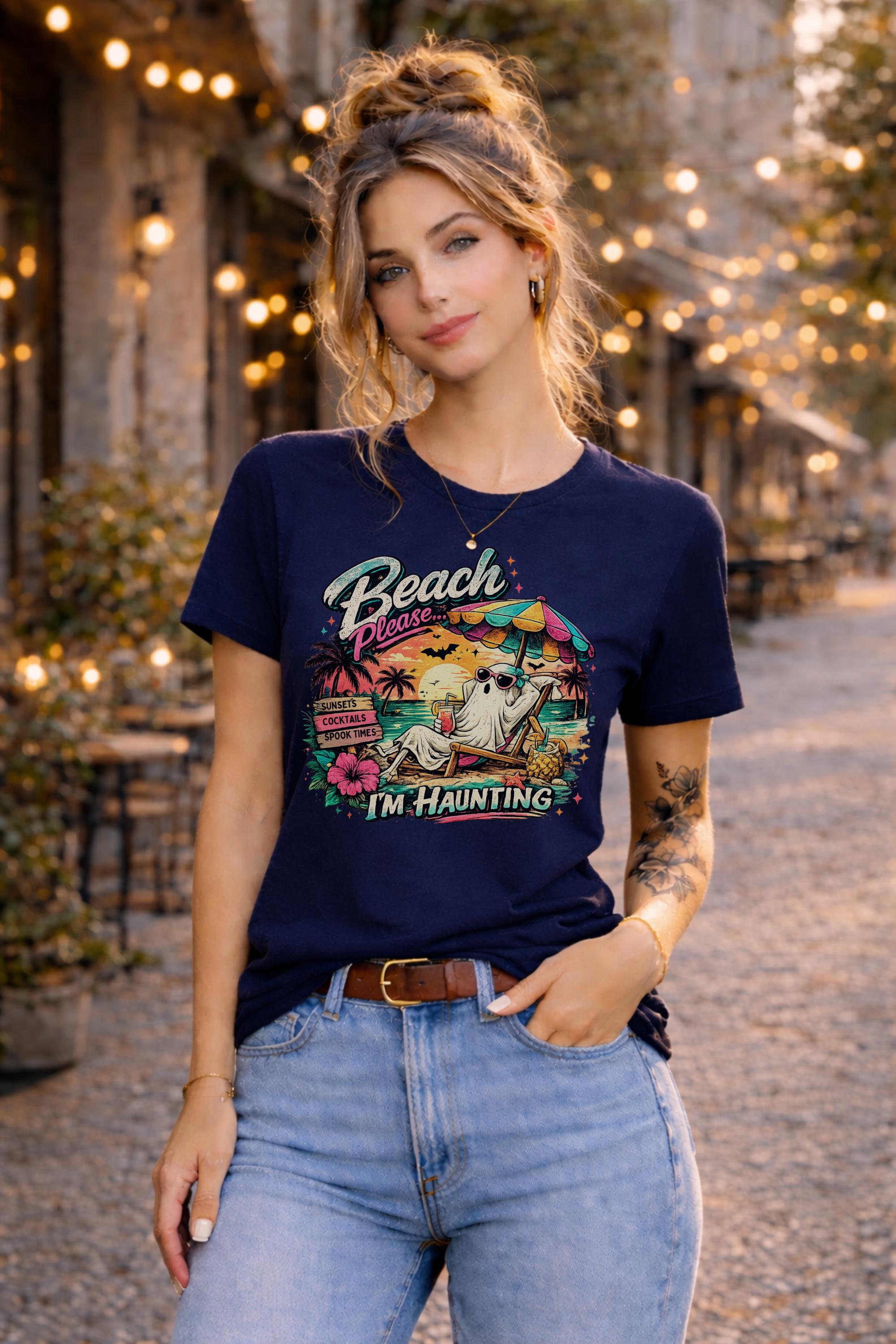 Summerween graphic tee with lounging ghost, tropical flowers, beach umbrella, and humorous "I'm Haunting" message.