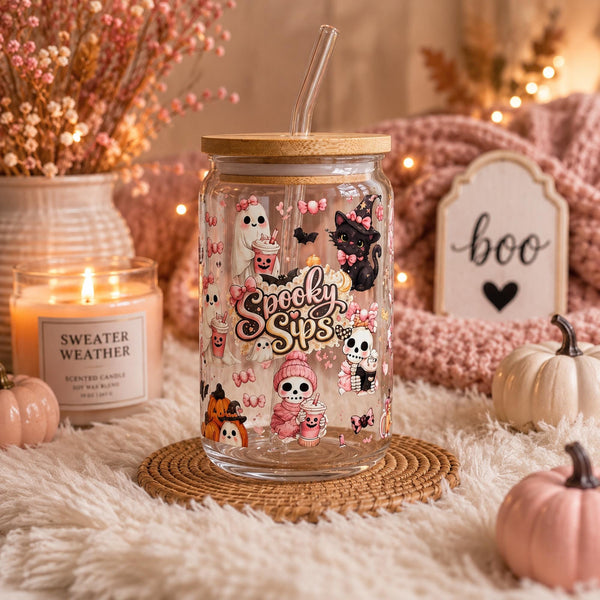 Halloween glass tumbler gift idea with bamboo lid, reusable straw and cute spooky ghost and pumpkin artwork.