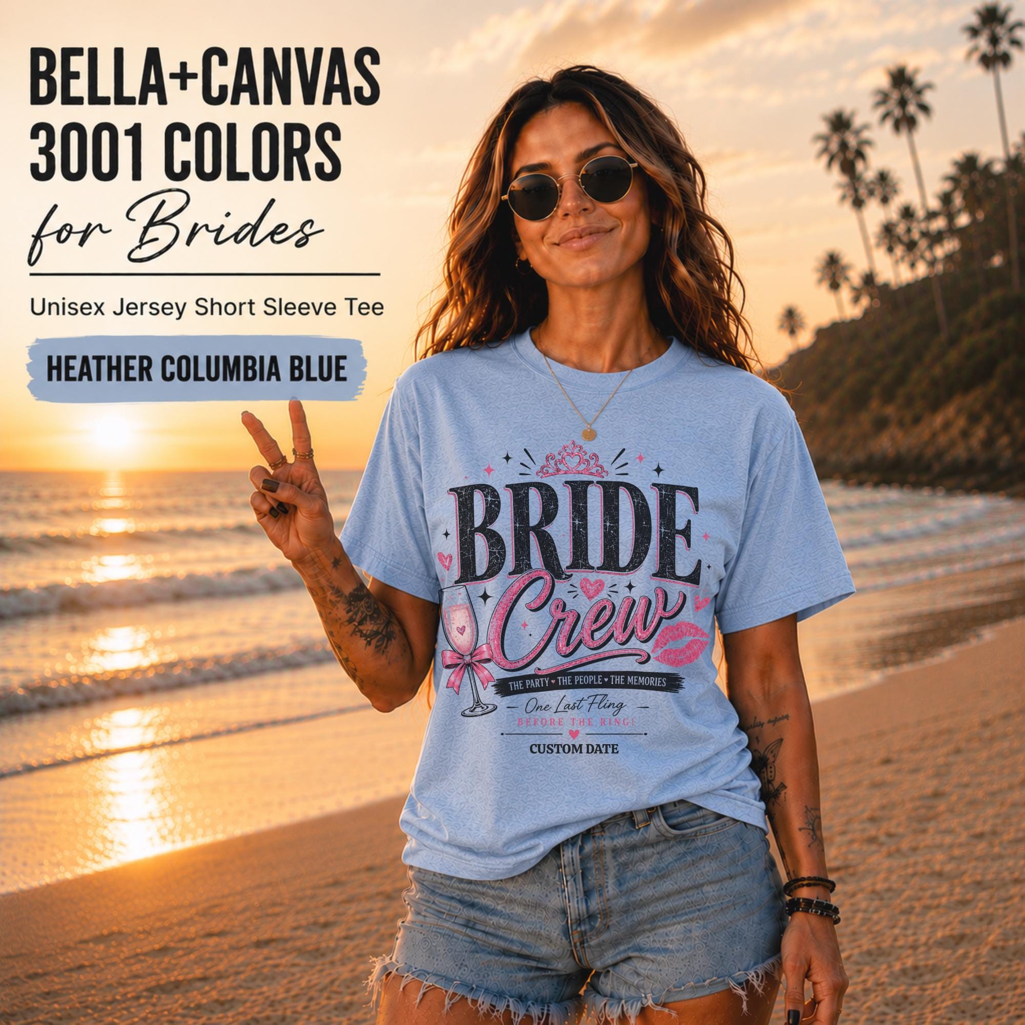 Bella+Canvas 3001 Heather Columbia Blue bride crew shirt featuring a pink and black bachelorette design with champagne glass, crown, kiss mark, and customizable wedding date.
