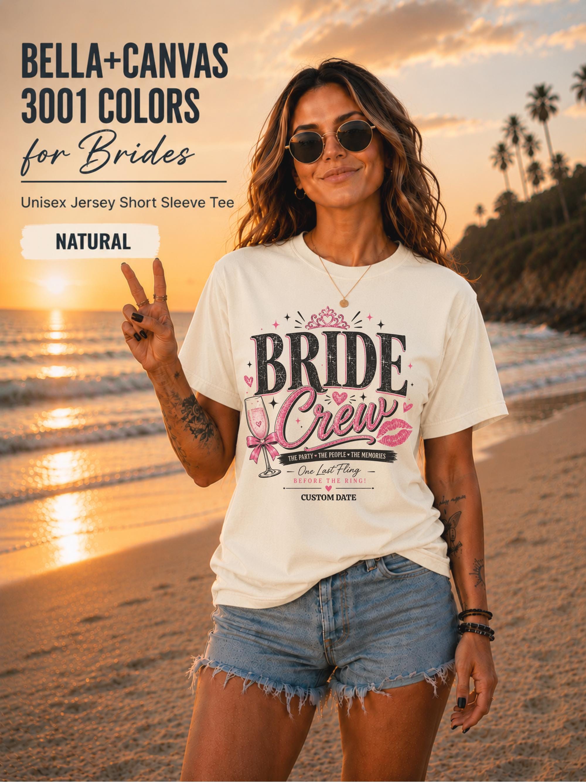 Bella+Canvas 3001 Natural bride crew shirt featuring a pink and black bachelorette design with champagne glass, crown, kiss mark, and customizable wedding date.
