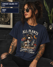 Comfort Colors 1717 Navy unisex t-shirt featuring a vintage skeleton holding coffee with the funny quote "All Plants Are Edible, Some Only Once," surrounded by flowers, mushrooms, and spooky botanical artwork.