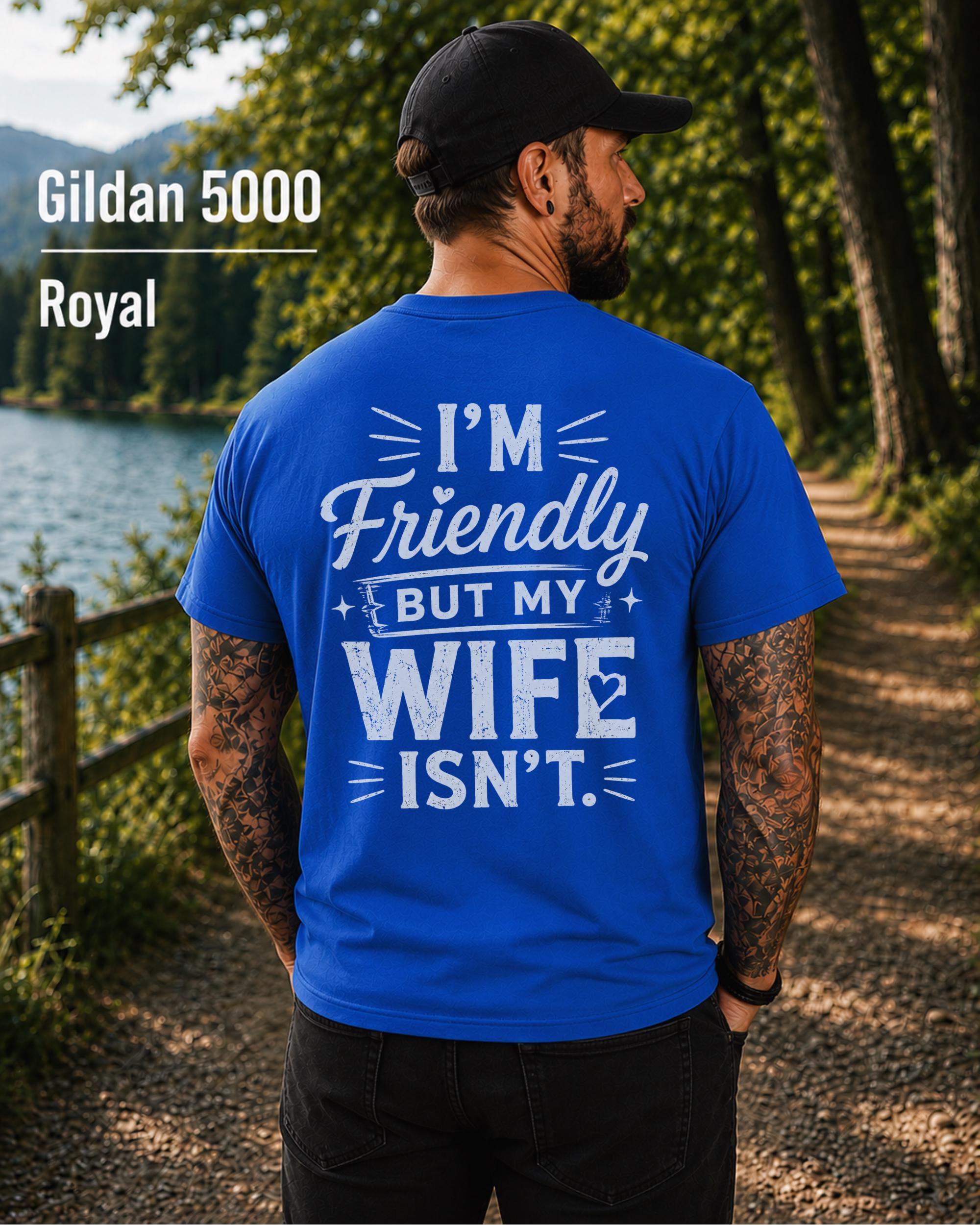 Funny husband t-shirt with "I'm Friendly But My Wife Isn't" back print on a royal Gildan 5000 unisex tee, humorous men's graphic shirt for husbands, dads, and Father's Day gifts.