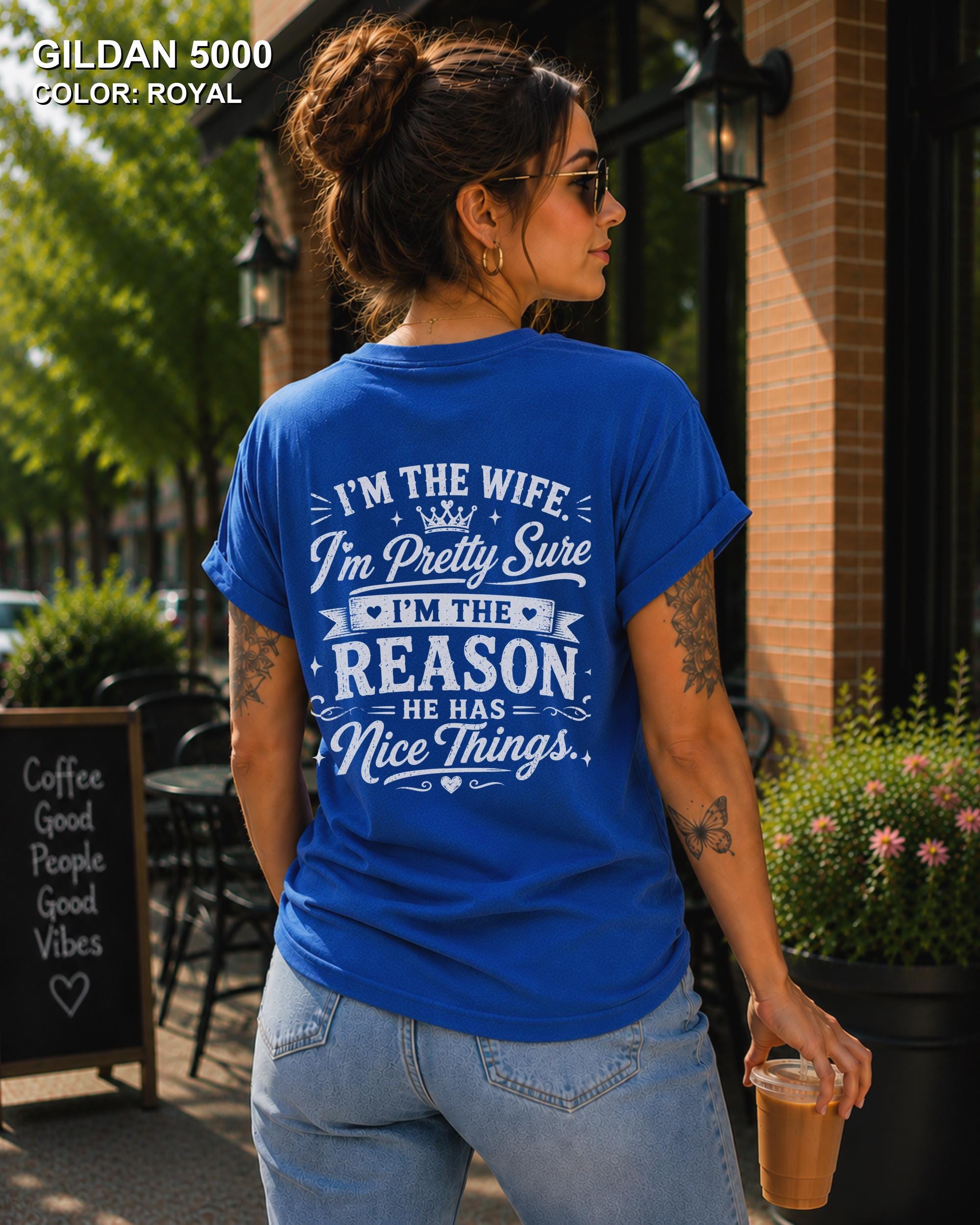 Women's funny wife t-shirt featuring "I'm the Wife, I'm Pretty Sure I'm the Reason He Has Nice Things" back graphic on a Royal Gildan 5000 tee, humorous marriage shirt for wives.