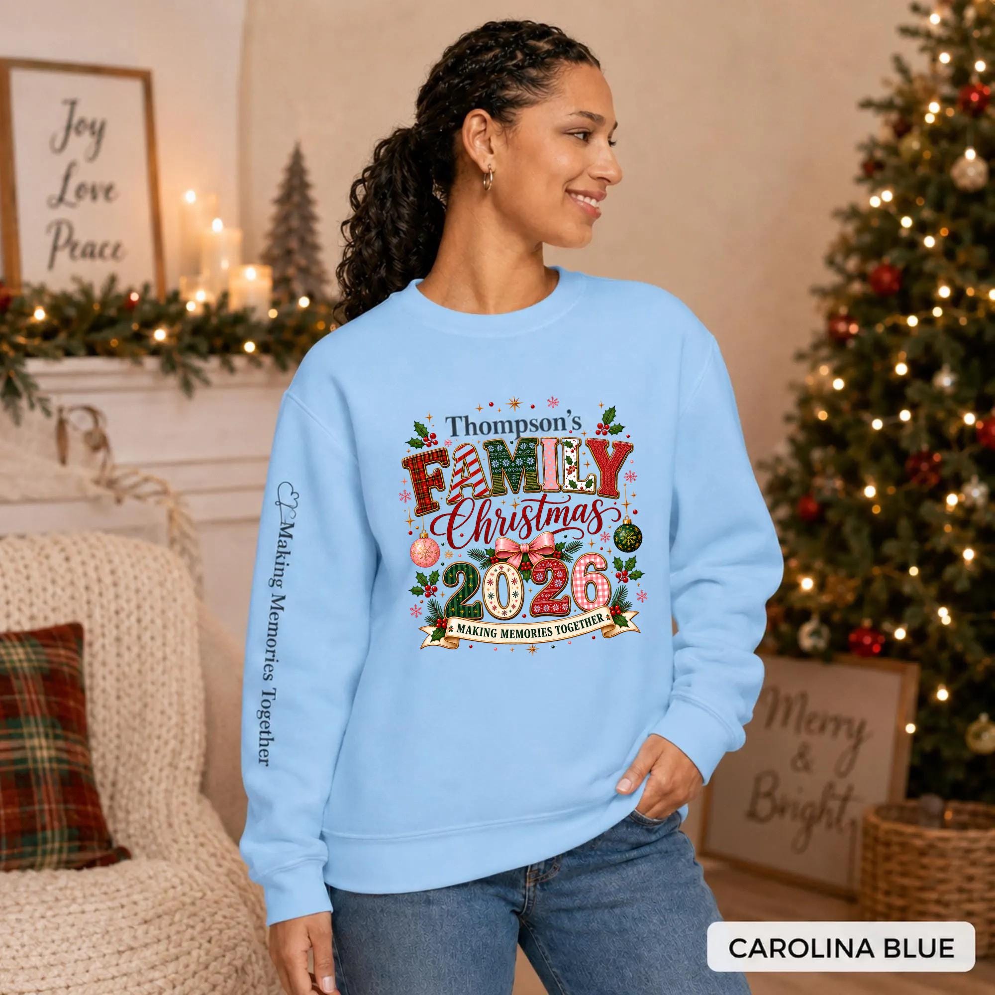 Carolina blue Christmas crewneck featuring a personalized Thompson’s Family Christmas 2026 design with festive lettering and sleeve text.