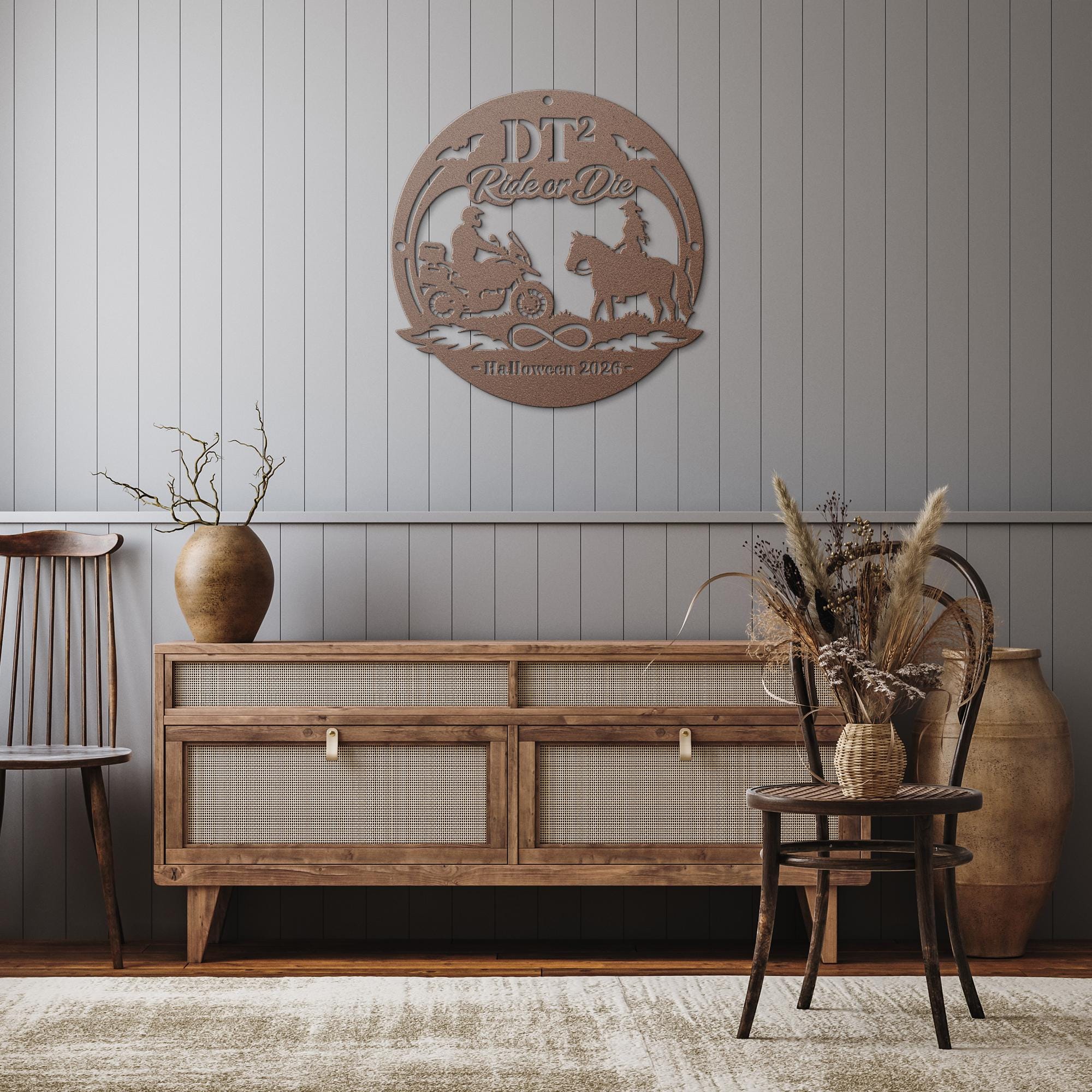 Personalized copper “Ride or Die” Halloween metal sign with motorcycle rider, horseback rider, bats, infinity symbol, custom initials, and year displayed on a decorated front porch.
