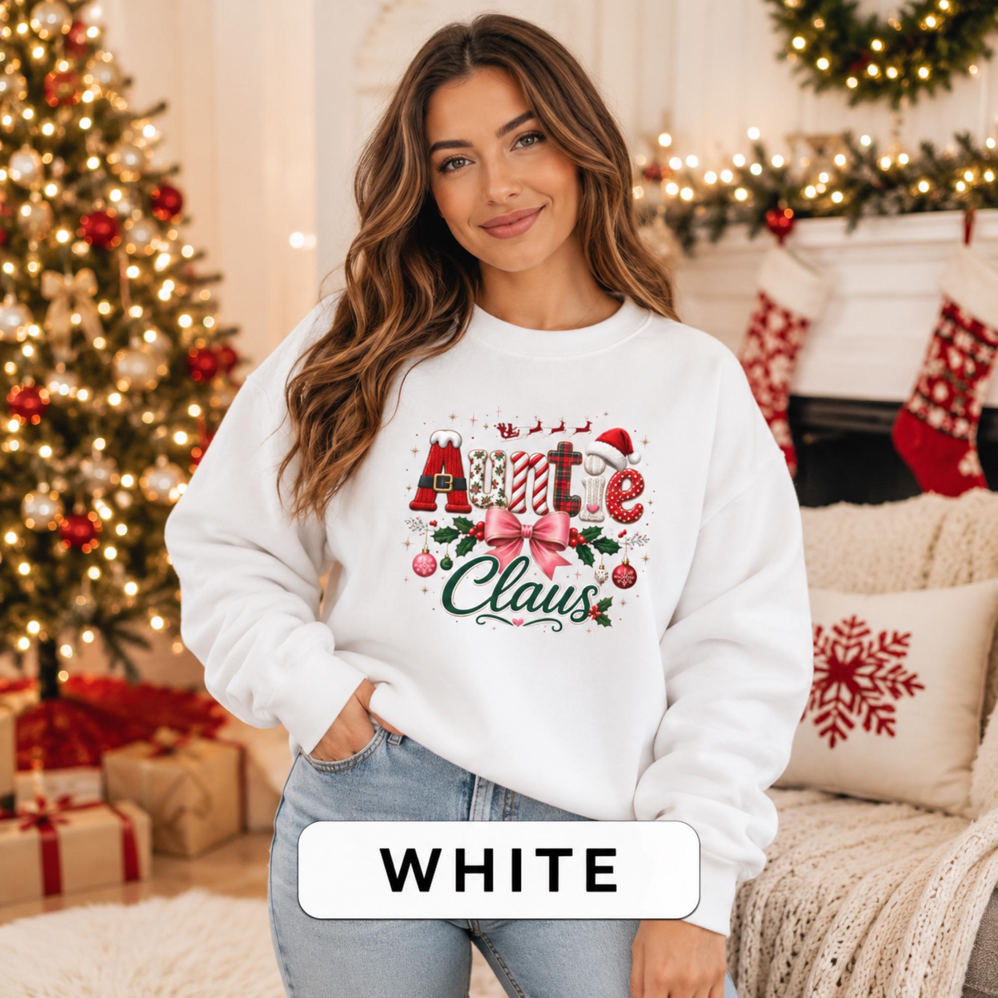 Cozy Auntie Claus sweatshirt styled with jeans in a warm Christmas living room with tree, stockings, and gifts.