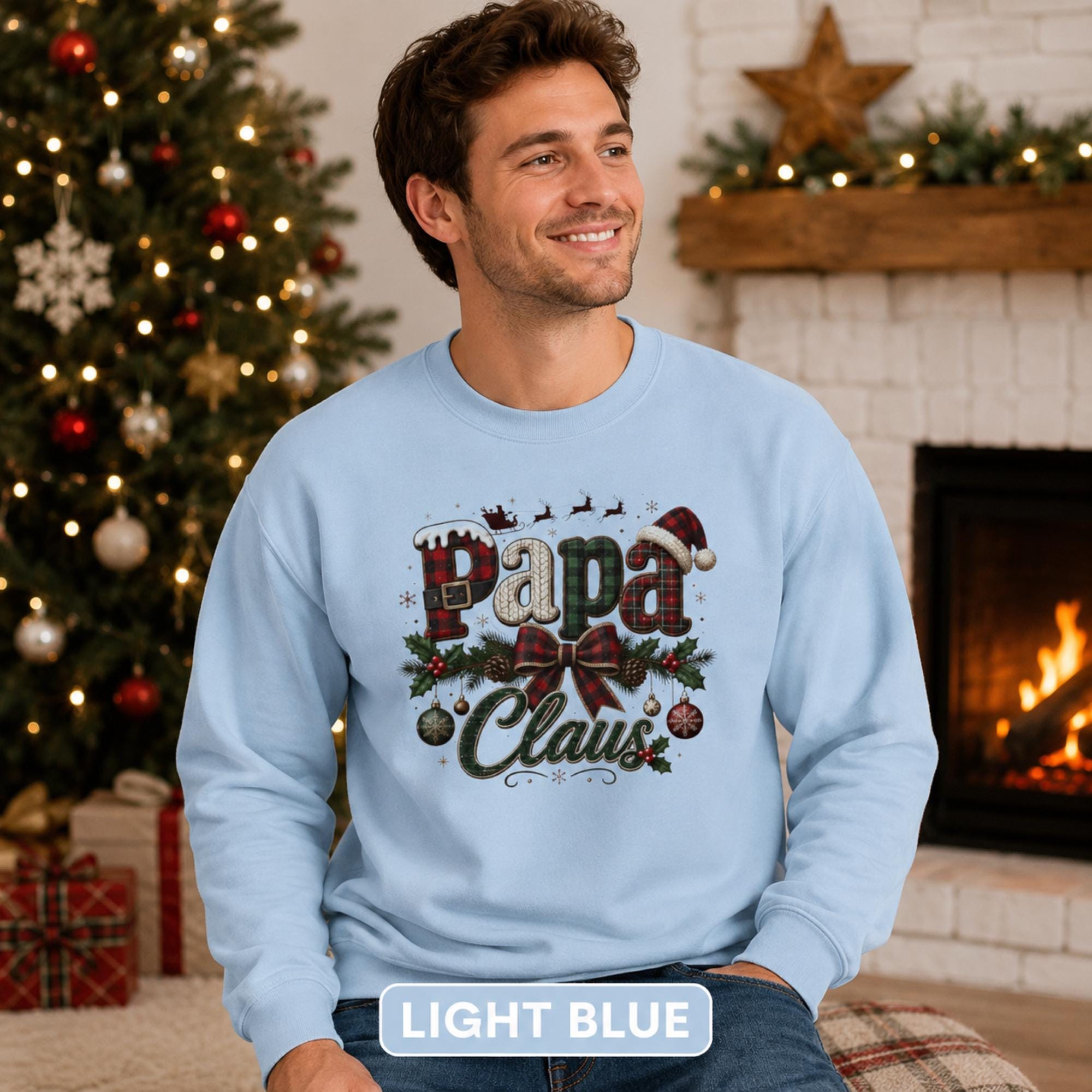 Light blue holiday crewneck featuring a vintage Papa Claus design perfect for Christmas celebrations and family gatherings.