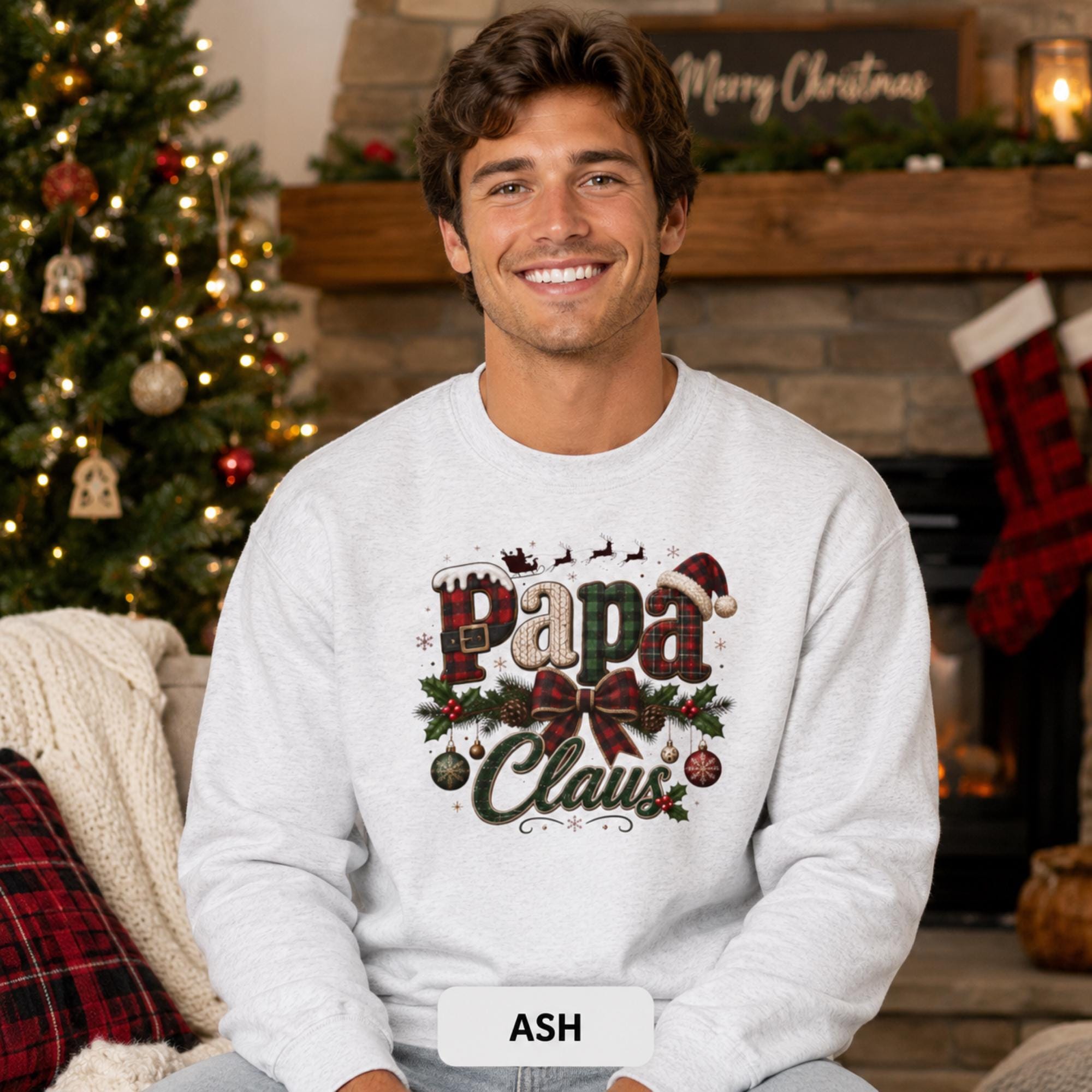 Papa Claus Christmas sweatshirt with buffalo plaid lettering, pinecones, holly, hanging ornaments, and festive bow.