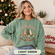 Festive women's Christmas sweatshirt with vintage-inspired Christmas artwork and soft unisex crewneck fit.