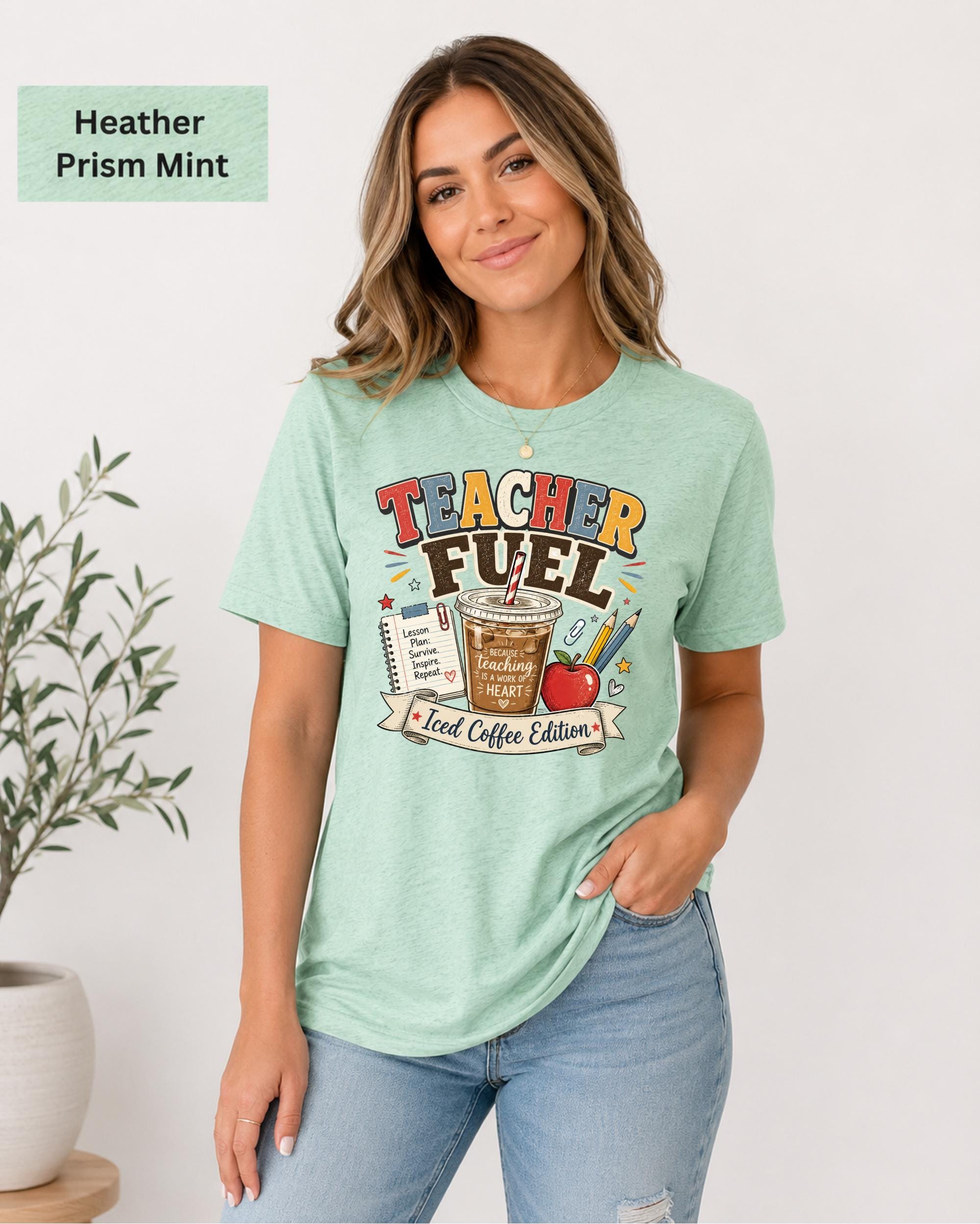 Woman wearing heather prism mint Bella Canvas Teacher Fuel Iced Coffee Edition teacher t-shirt with colorful classroom design.