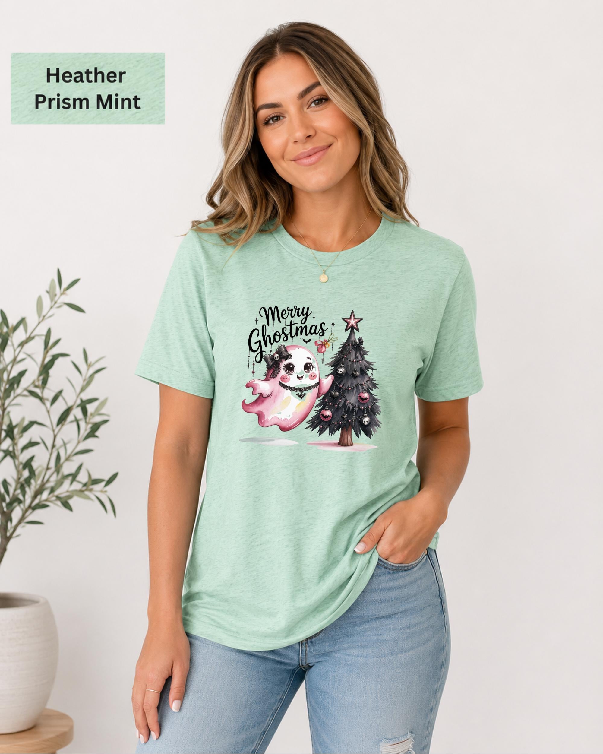 Women's spooky Christmas shirt featuring adorable ghost holiday artwork on heather prism mint unisex tee.