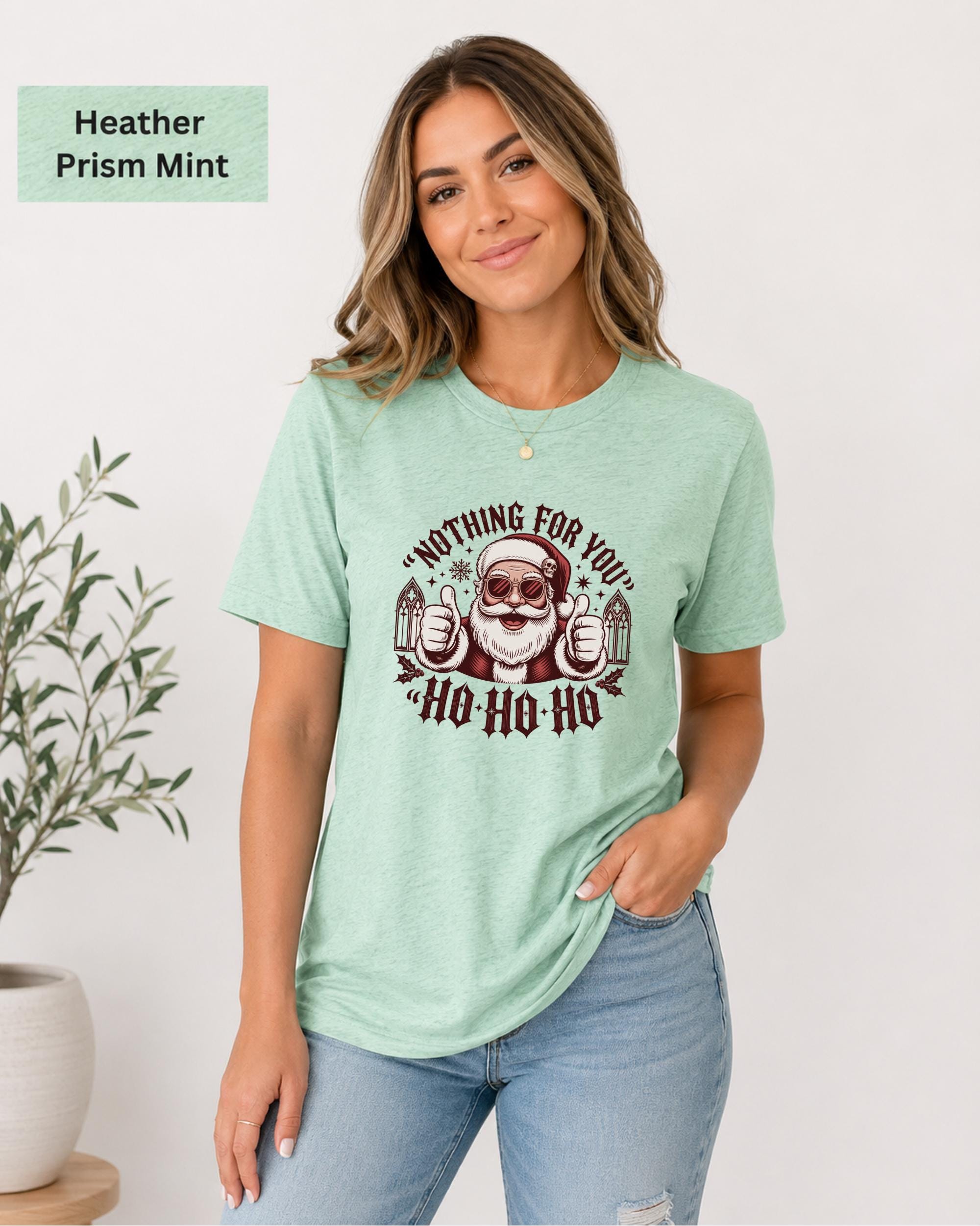 Soft Bella Canvas tee featuring edgy Christmas artwork in dark red and cream tones.
