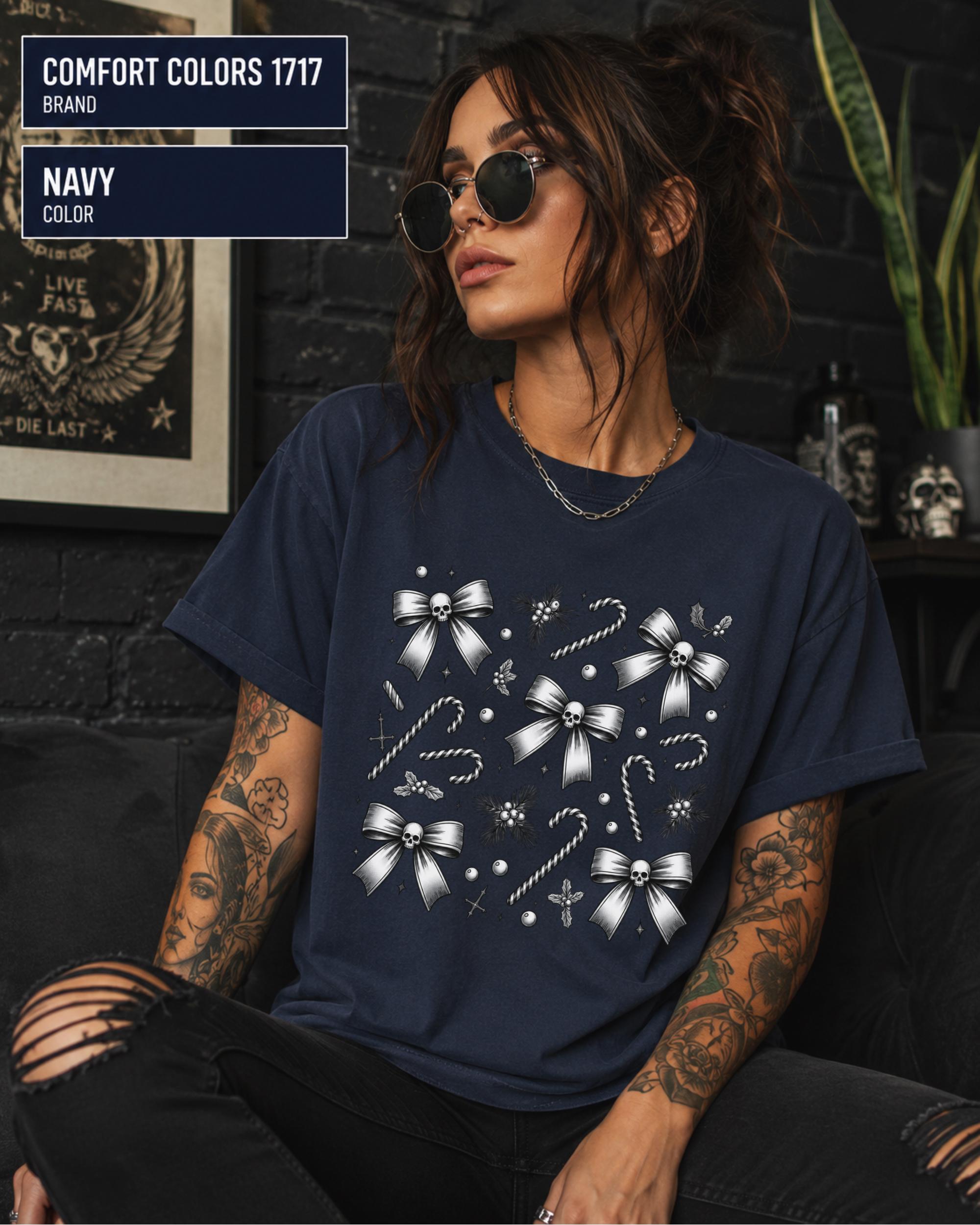 Navy Comfort Colors 1717 tee with detailed silver Christmas graphics and skull decorations.