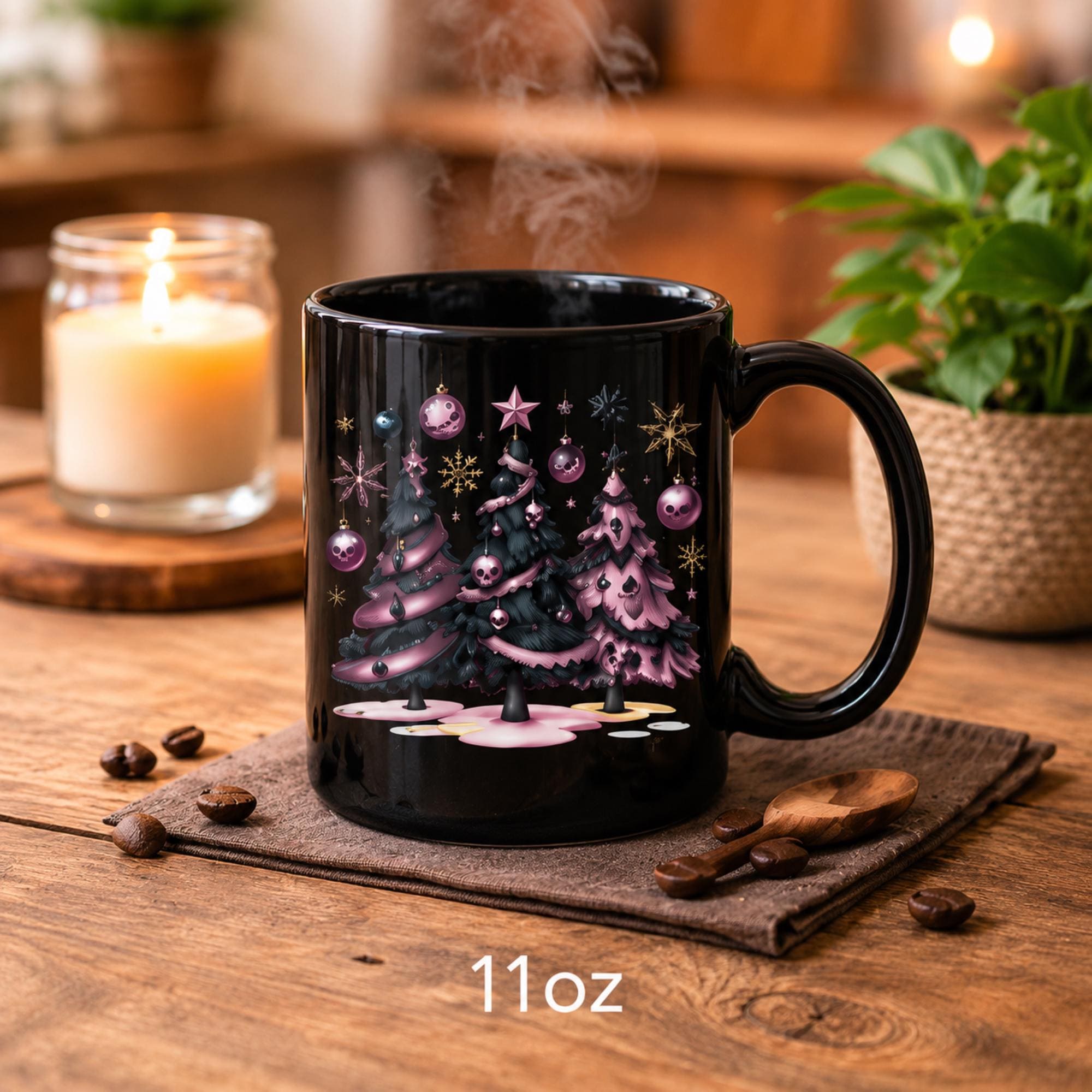 Black ceramic coffee cup displaying spooky Christmas tree design with pink ornaments.