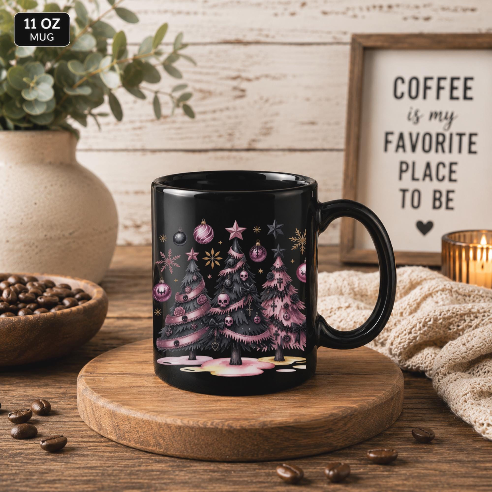 Black coffee mug featuring skull Christmas trees and festive pink decorations.