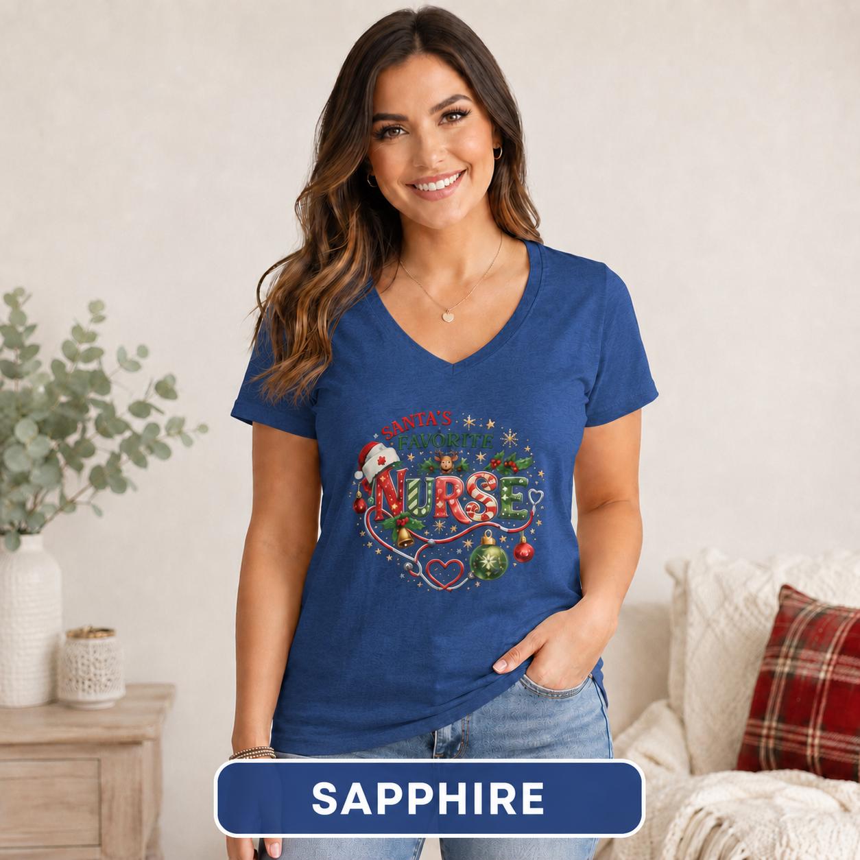 Holiday nurse tee featuring red and green lettering, holly, bells, ornaments, and snowflakes.