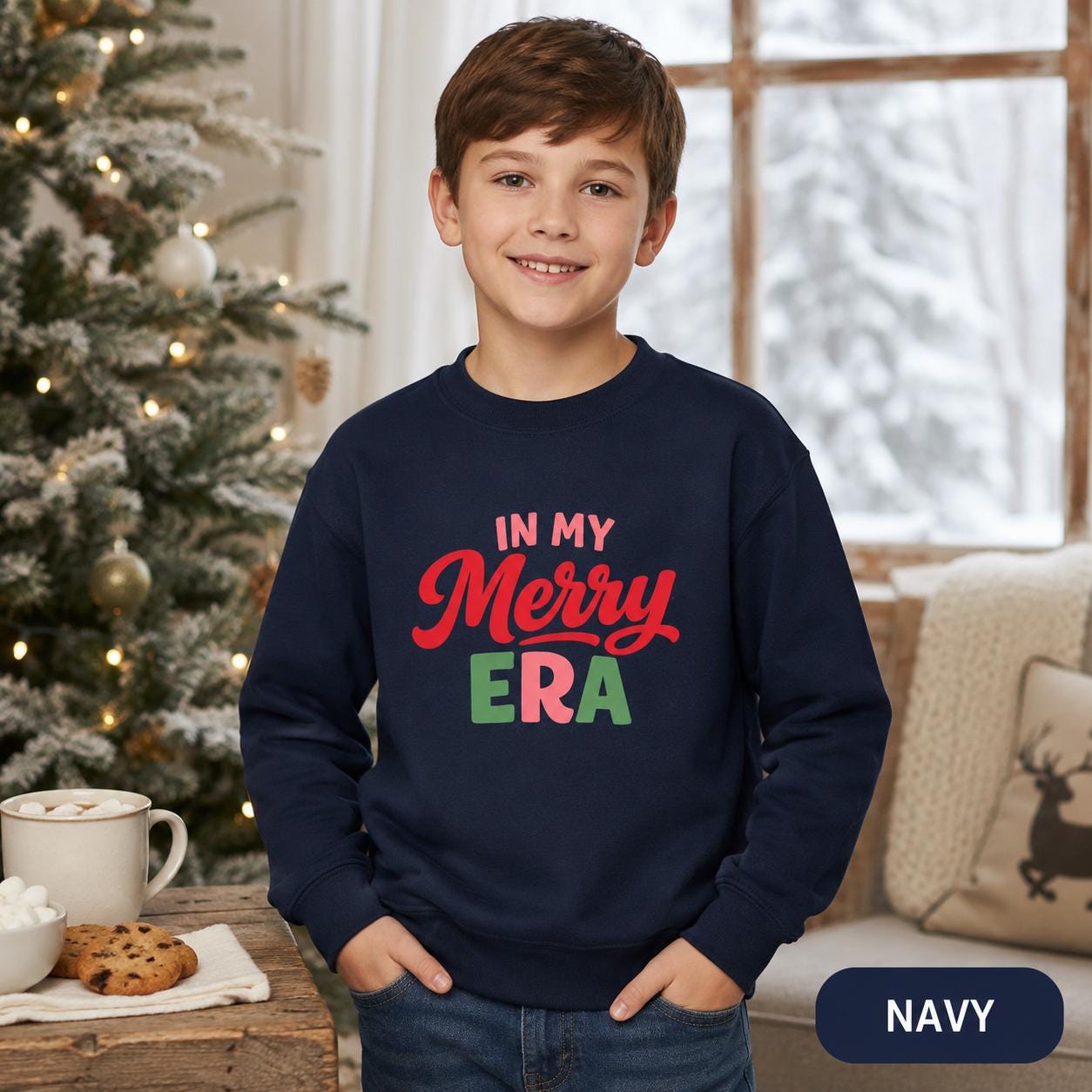 Festive kids outfit featuring bright seasonal typography on a navy sweatshirt.