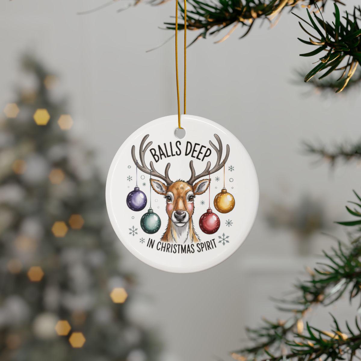 Glossy reindeer keepsake with front and back printing and gold hanging string.