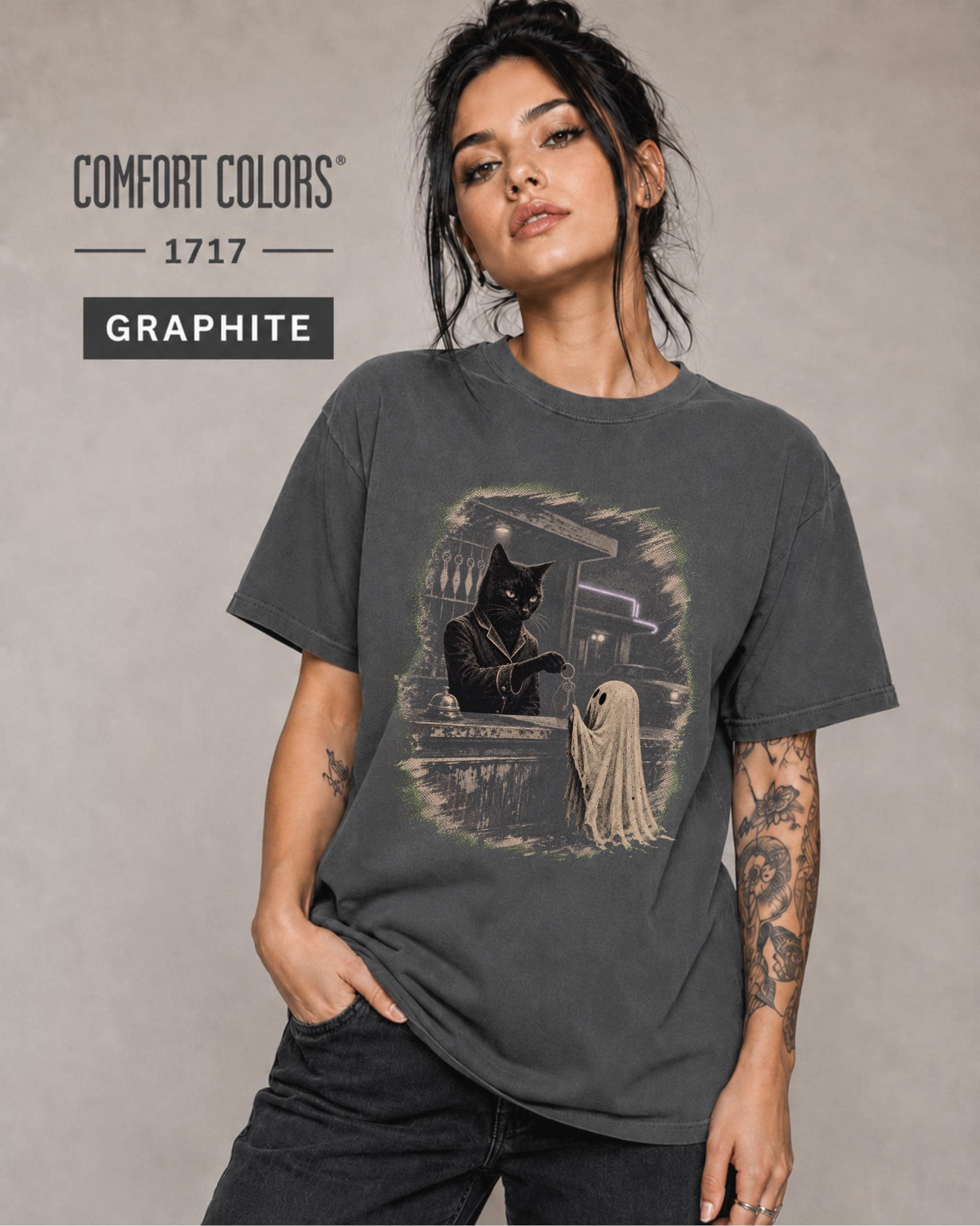 Comfort Colors Halloween tee styled in Graphite with moody black cat and ghost illustration.