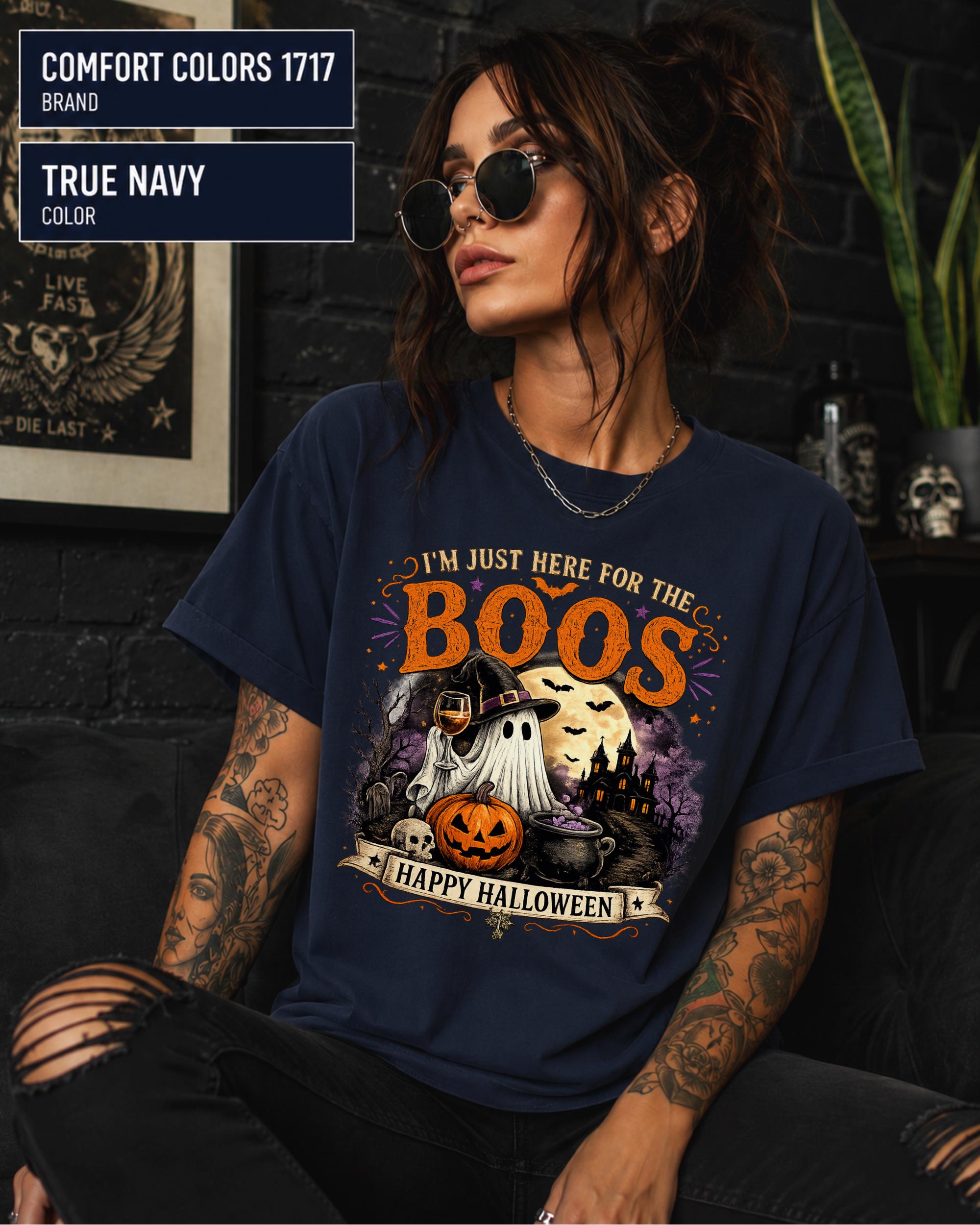 Vintage ghost graphic tee featuring a witch hat, drink, pumpkins, bats, and haunted house.