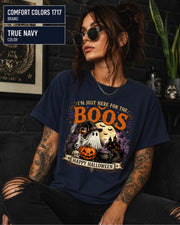 Vintage ghost graphic tee featuring a witch hat, drink, pumpkins, bats, and haunted house.