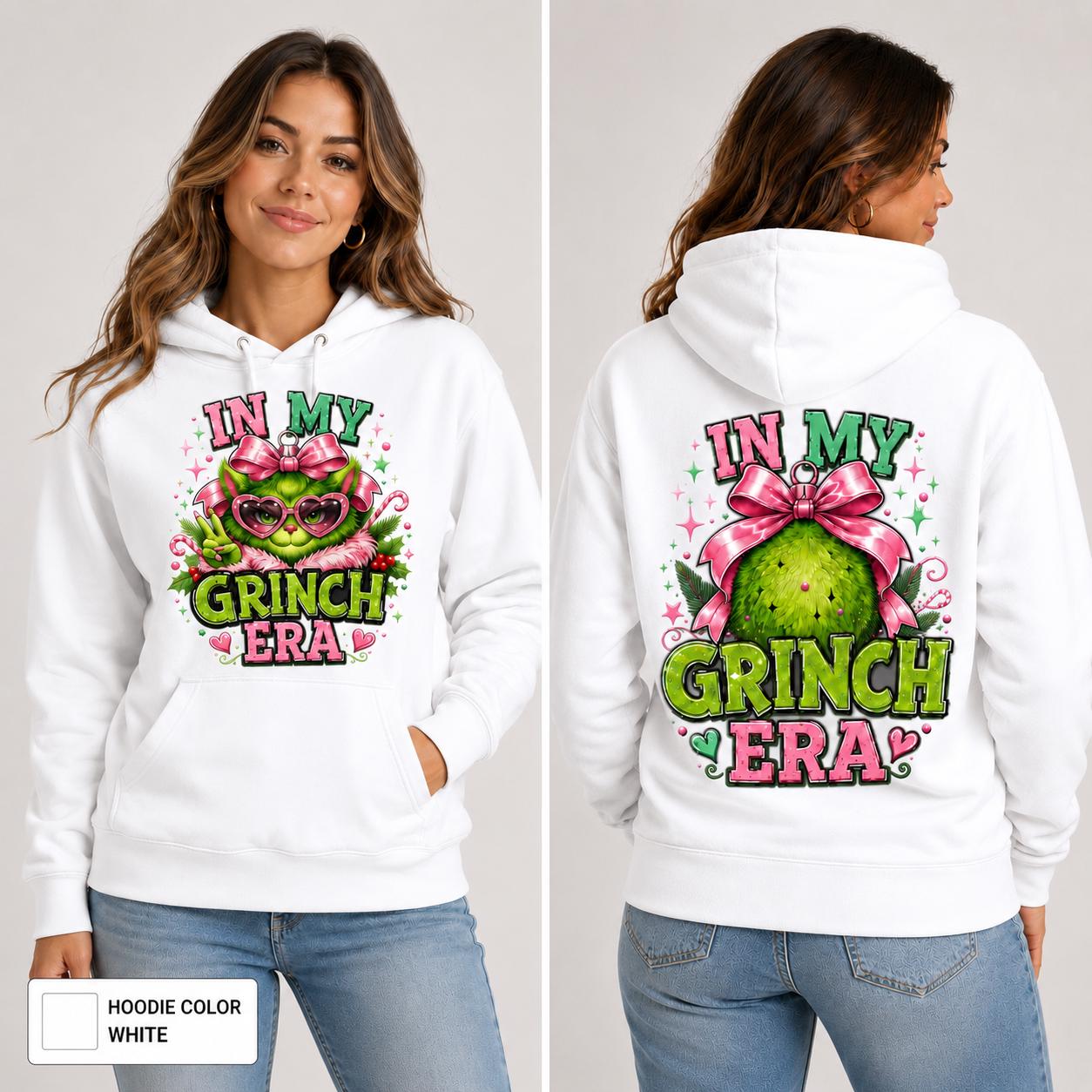 Female model wearing a white hoodie featuring a colorful pink and green Christmas character design on the front & back