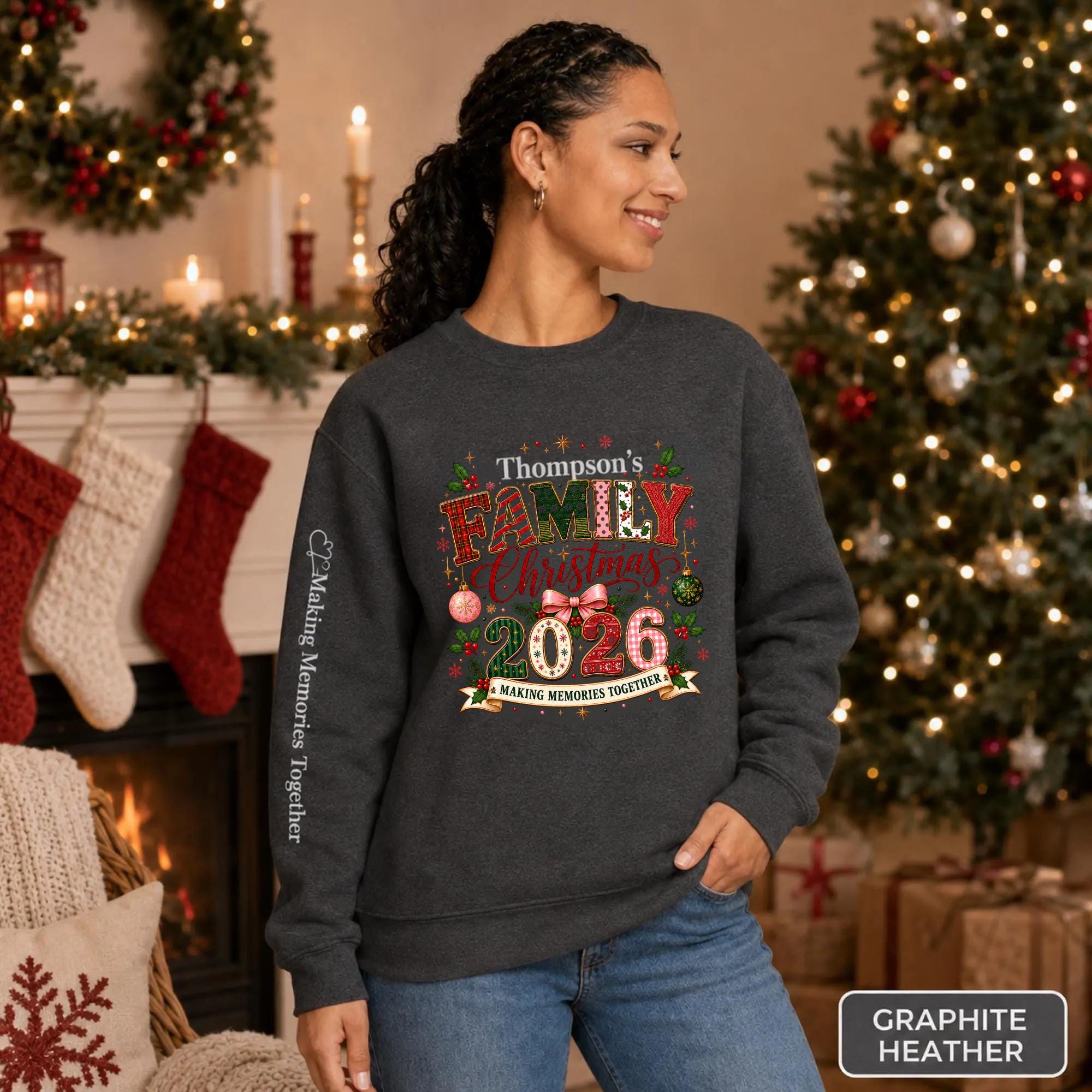 Graphite Heather Christmas crewneck featuring a personalized Thompson’s Family Christmas 2026 design with festive lettering and sleeve text.