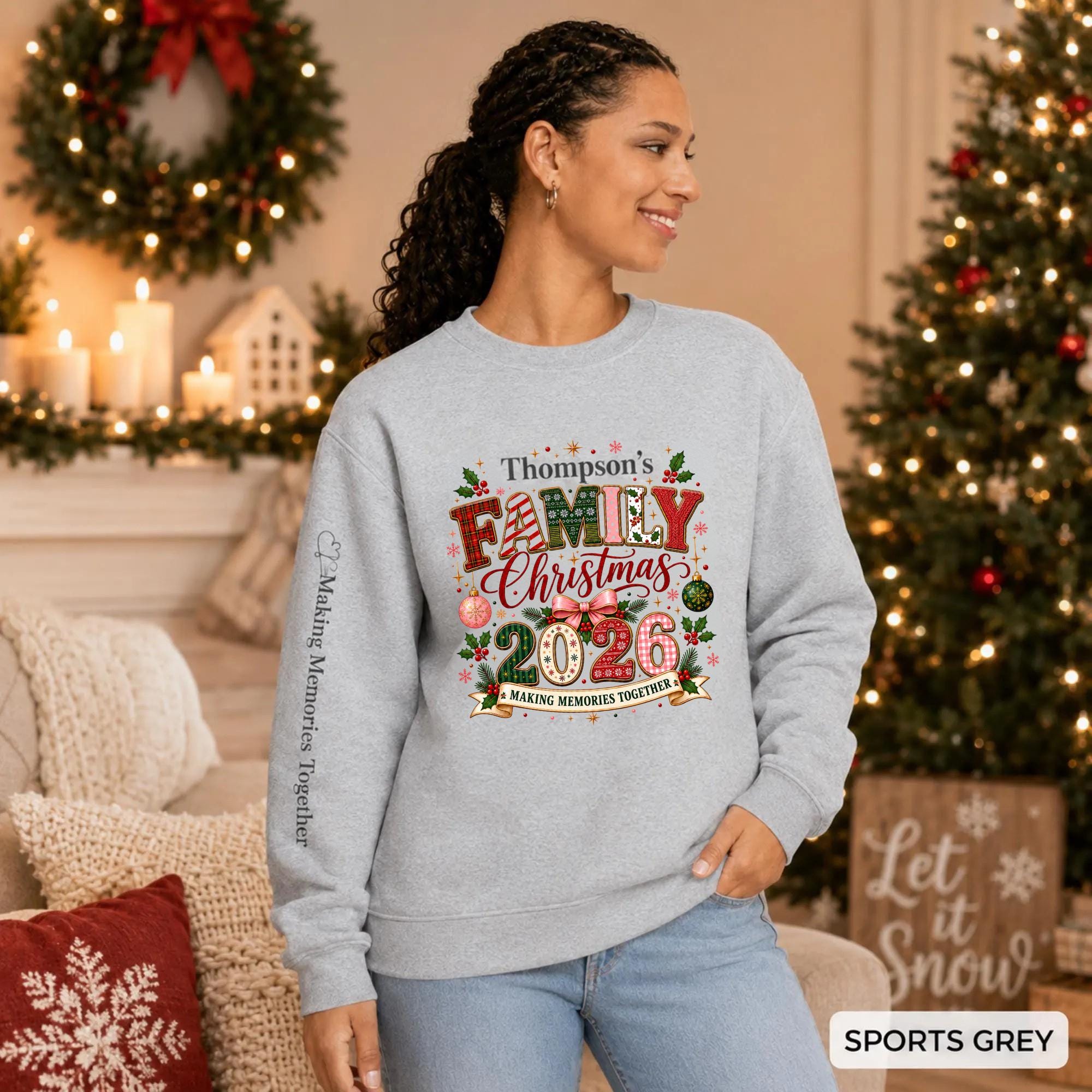 Sports Grey Christmas crewneck featuring a personalized Thompson’s Family Christmas 2026 design with festive lettering and sleeve text.
