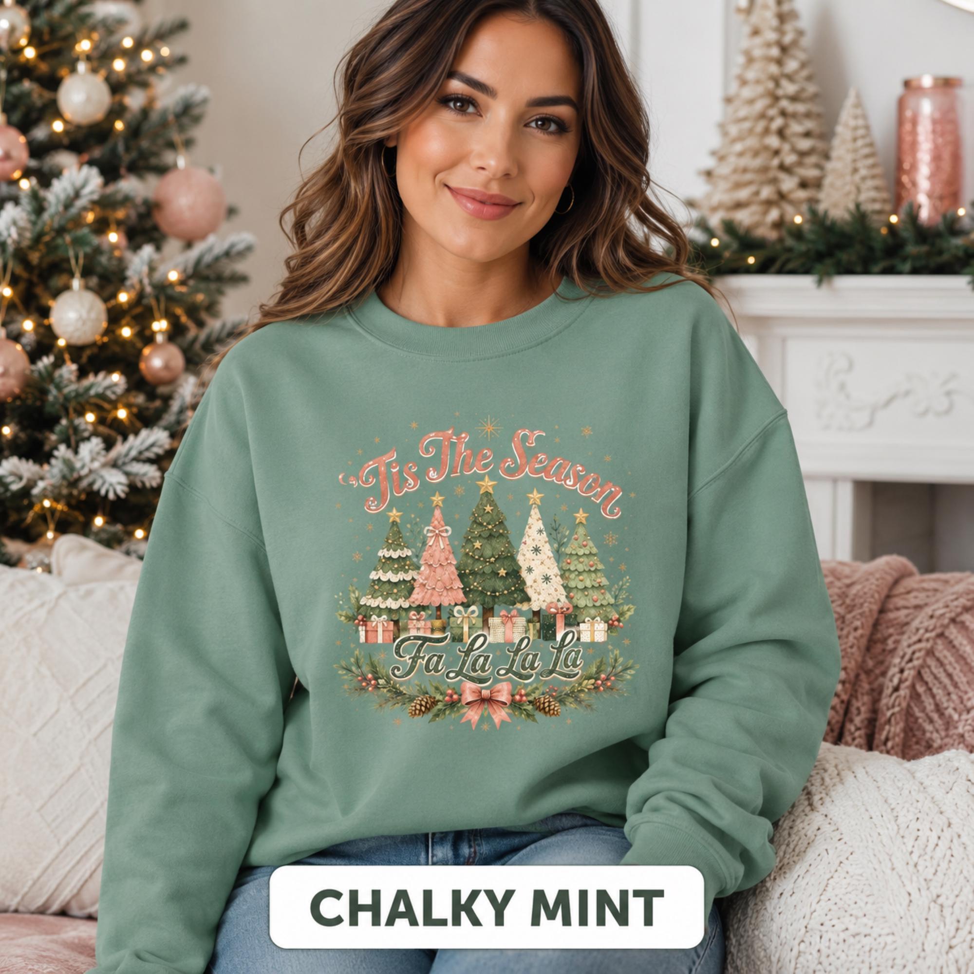 Vintage-inspired Christmas sweatshirt with colorful decorated trees, holiday greenery, and festive Fa La La La artwork.