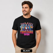 Male model wearing a black T-shirt featuring stylish cartoon rabbits and bold “Let the Tariff Games Begin” text.