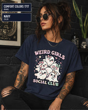 Spooky cute Halloween shirt with Weird Girls Social Club lettering, hearts, stars, and ghost artwork.