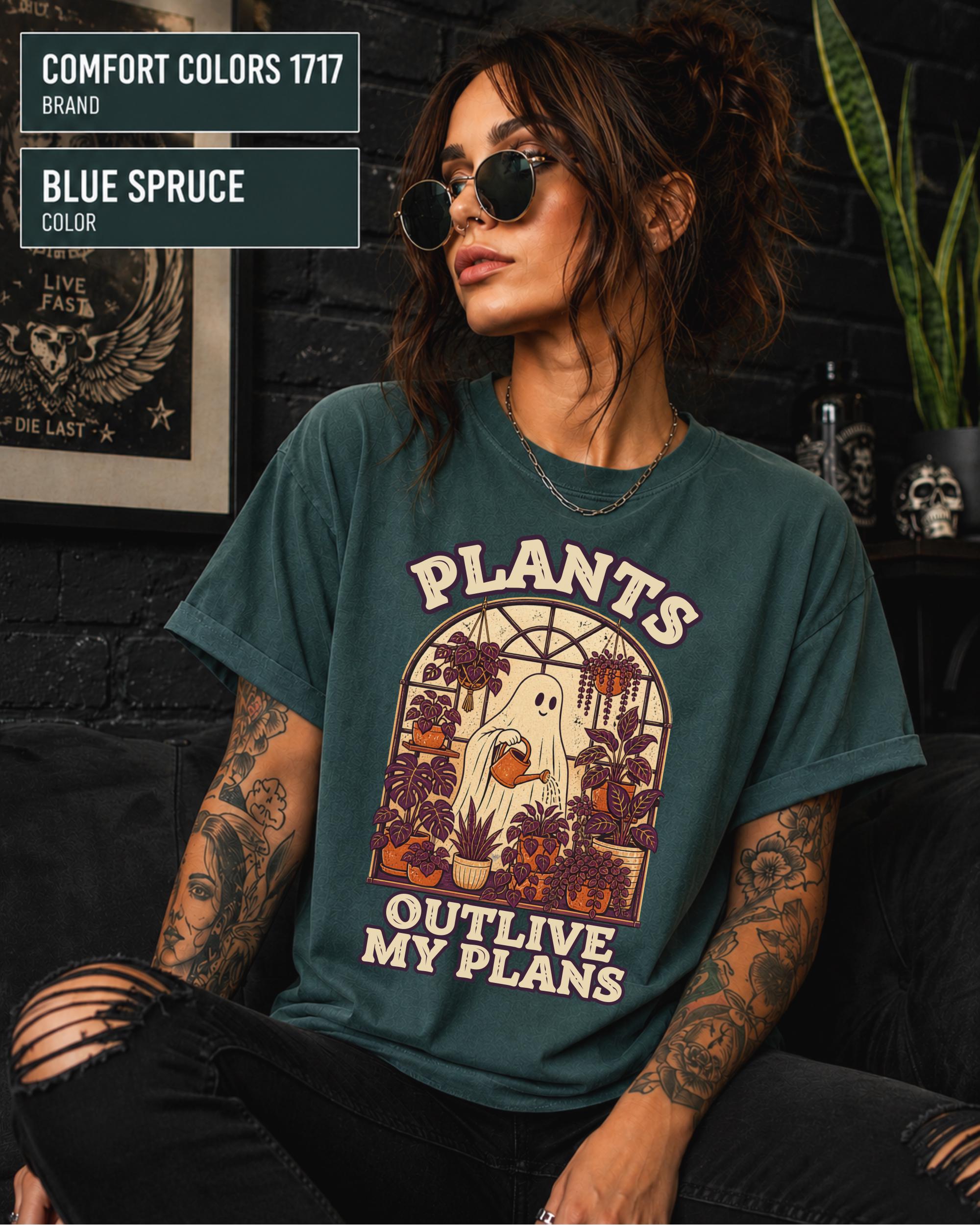 Model wearing Comfort colors tshirt in the color blue spruce featuring a Retro cream and orange ghost watering purple houseplants inside a greenhouse with the words Plants Outlive My Plans.