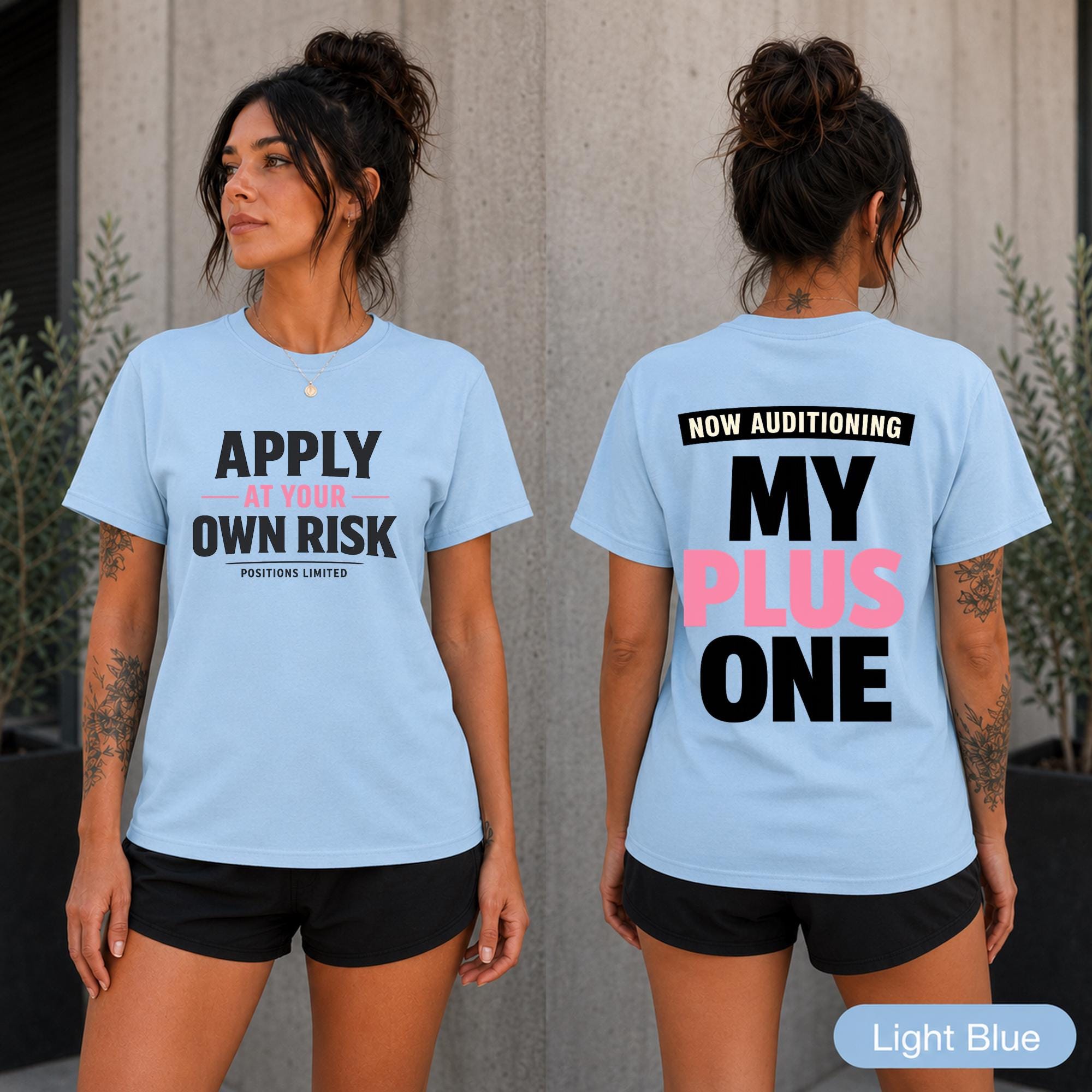 Light blue front and back T-shirt mockup featuring Apply at Your Own Risk on the front and Now Auditioning My Plus One on the back.
