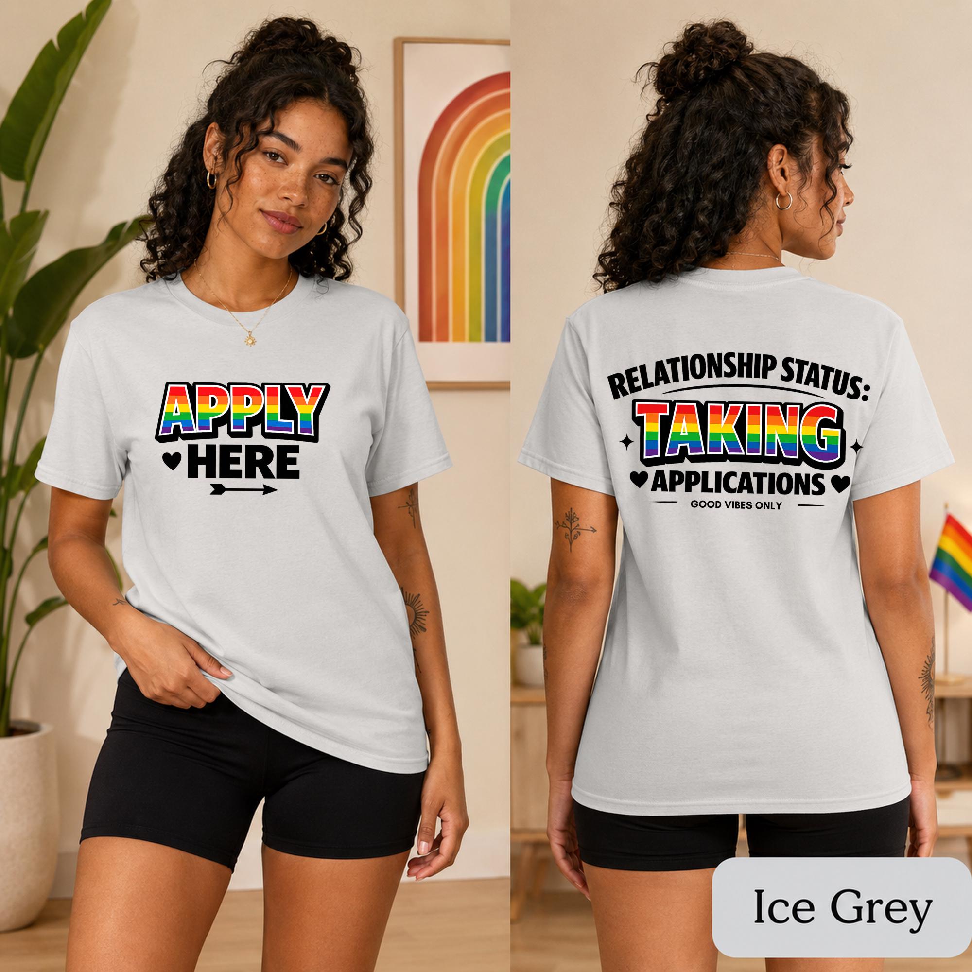 Front-print Pride top featuring bright striped lettering and a playful application message.