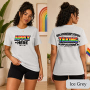 Front-print Pride top featuring bright striped lettering and a playful application message.
