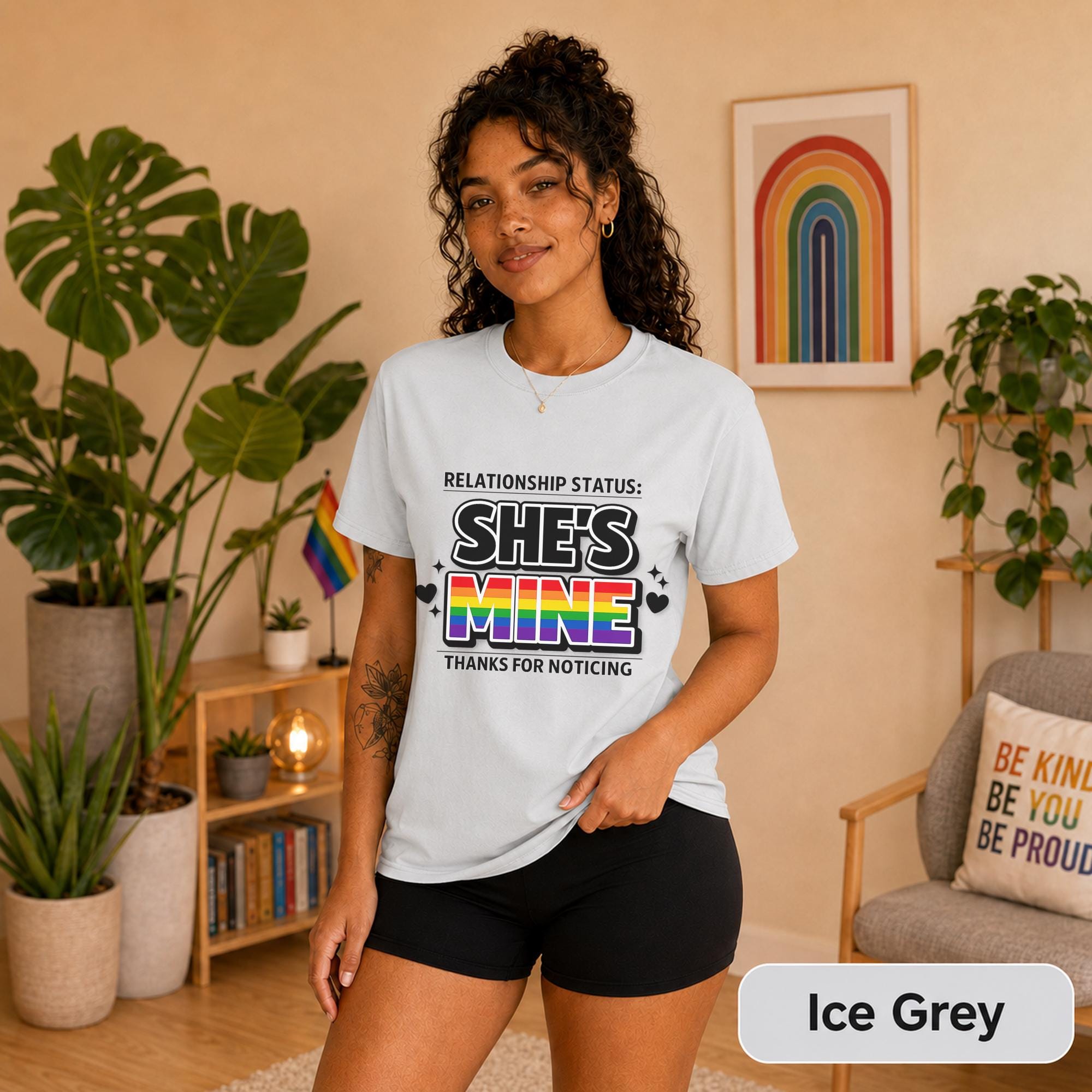 Pride couple outfit featuring coordinated relationship status graphic tees in a bright home setting.