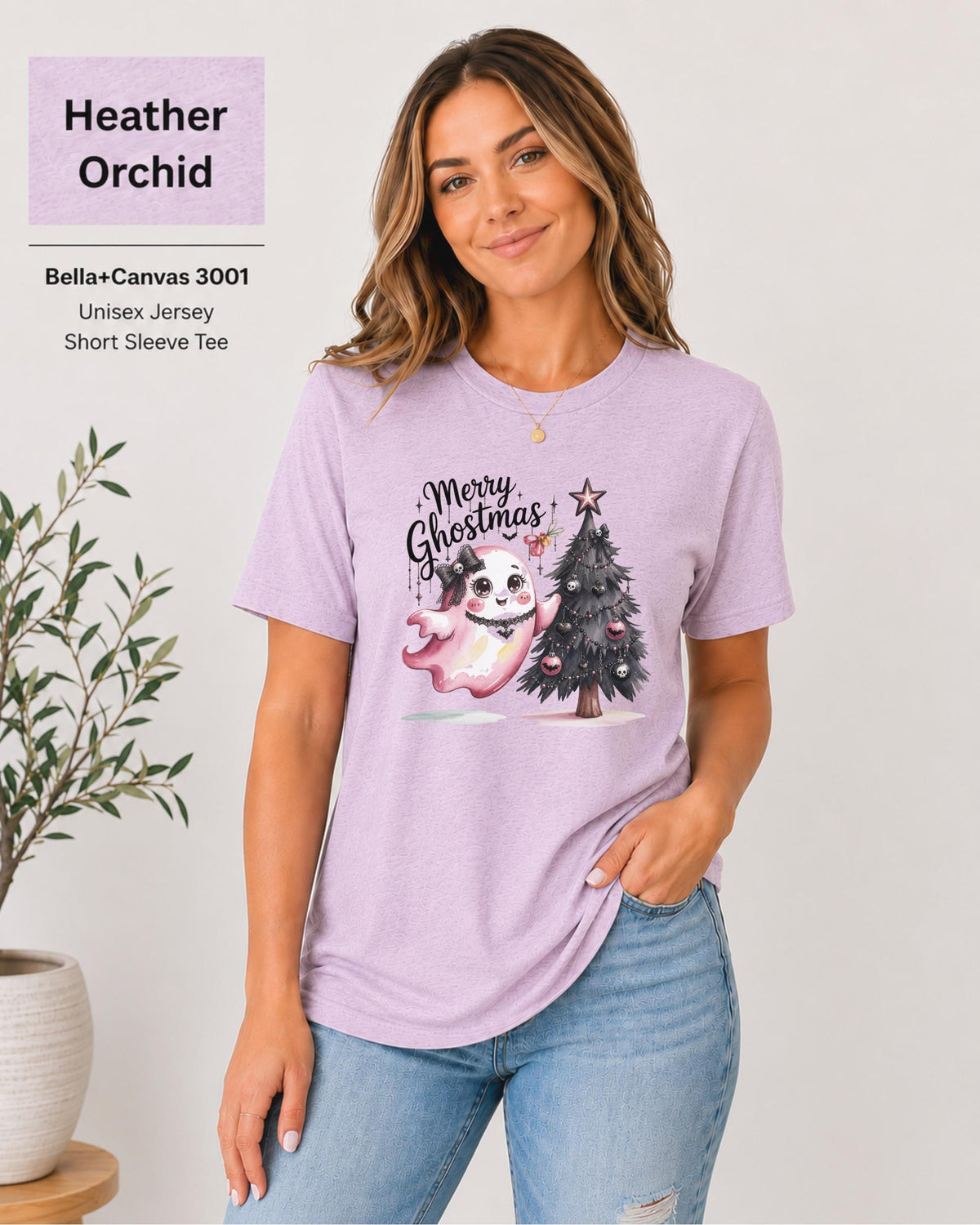Alternative holiday graphic tee with pink ghost and gothic festive design.