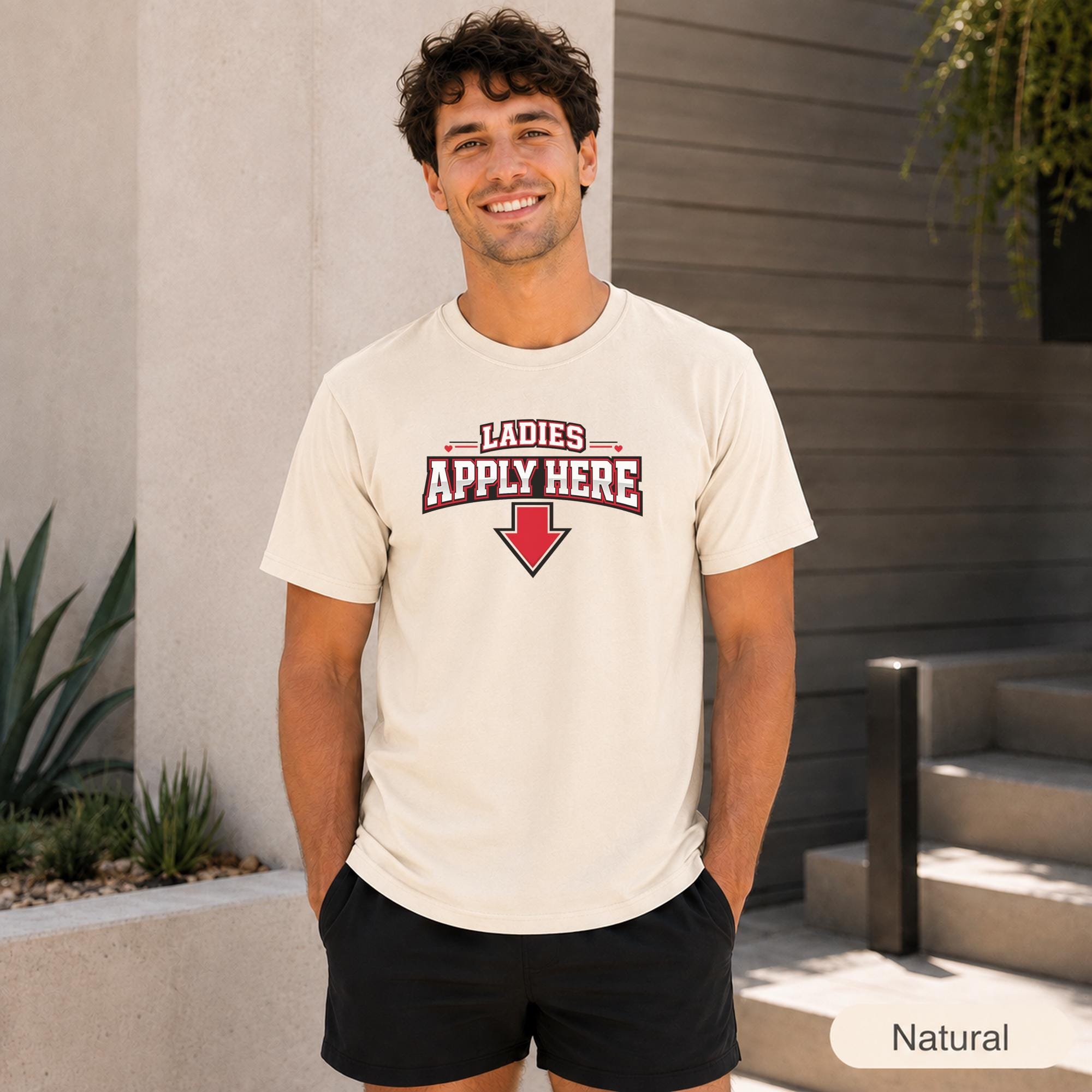Front view of a funny men’s dating tee featuring bold red, black, and white varsity lettering.