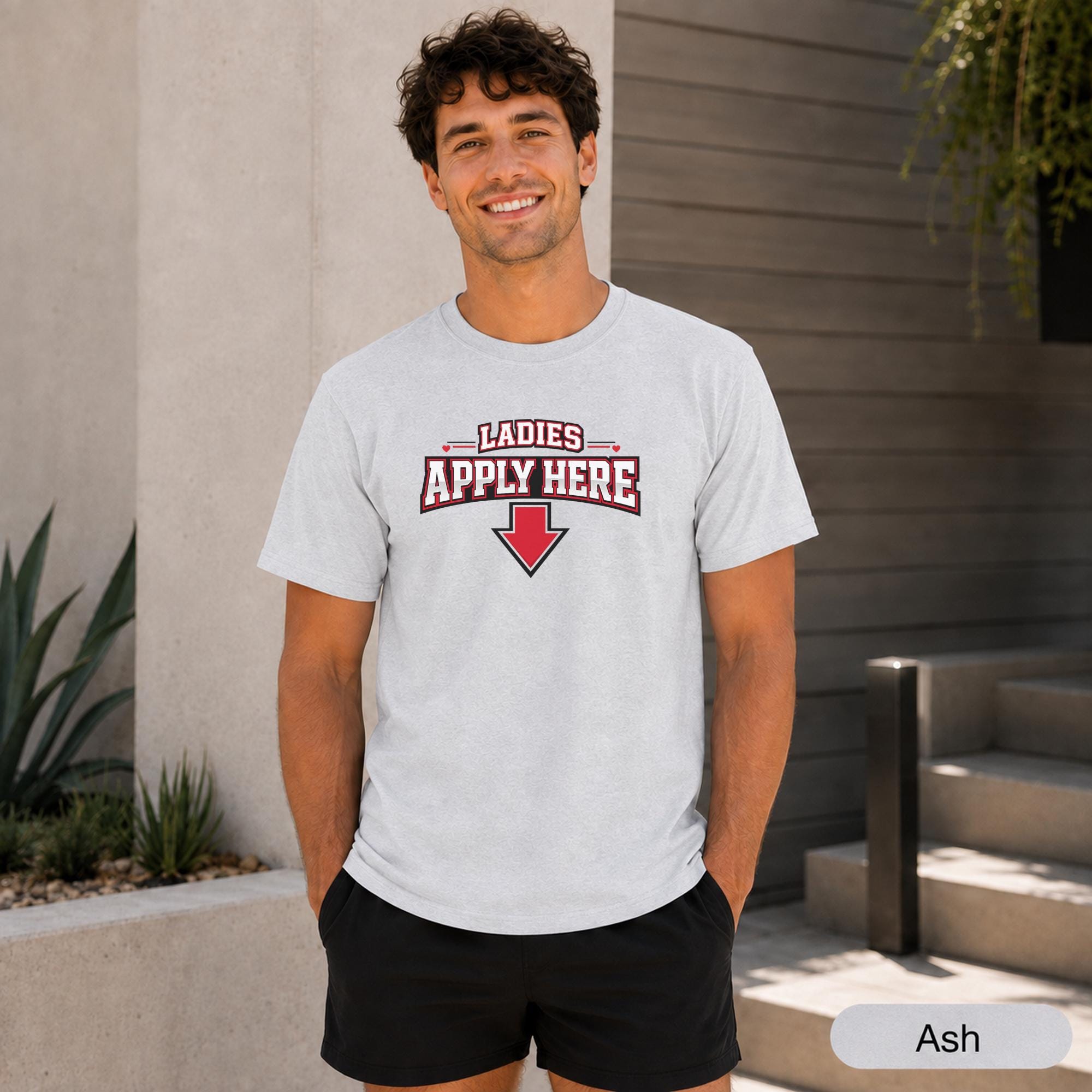 Men’s relationship humor tee featuring a front application message and large back graphic.