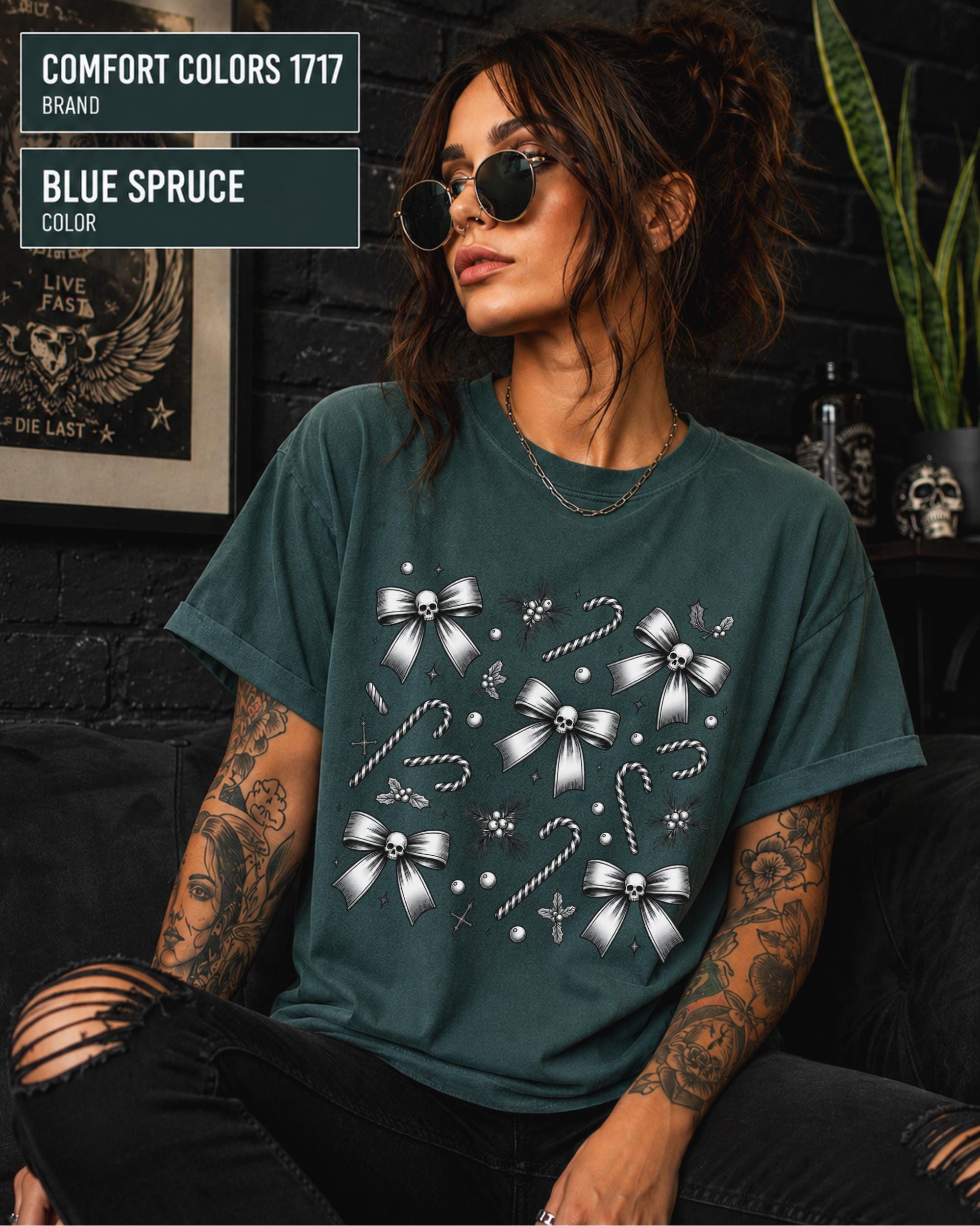 Comfort Colors holiday shirt styled with black jeans for a dark seasonal outfit.