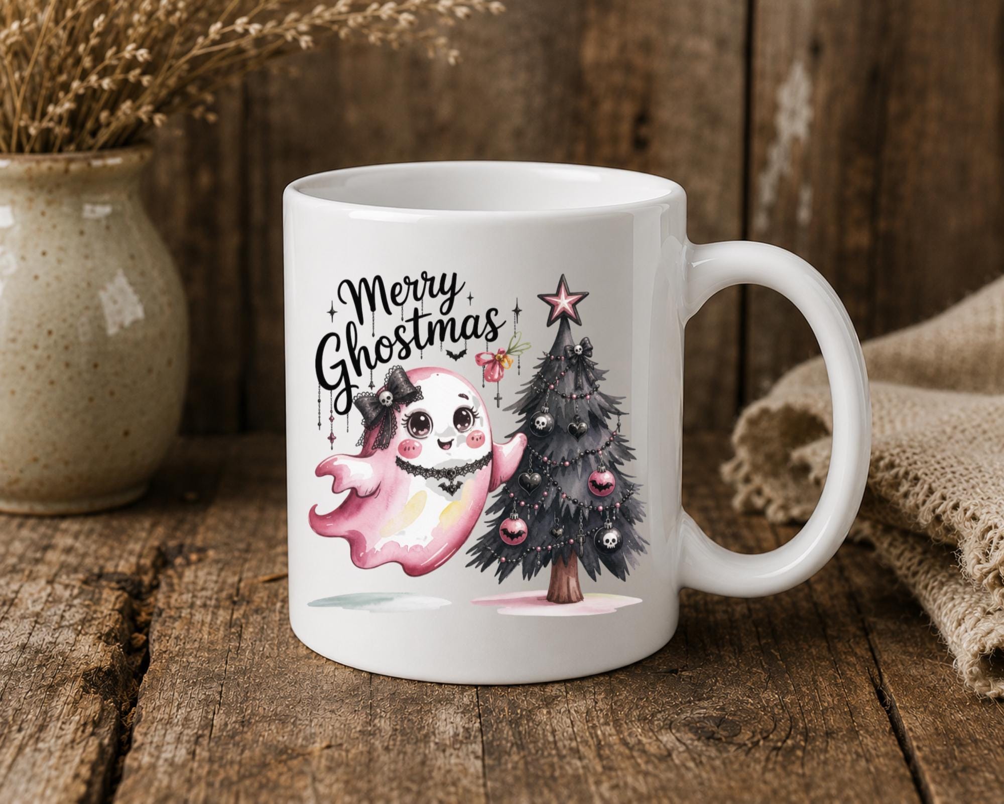 Cute ghost Christmas coffee mug with pink holiday artwork available in 11 oz and 15 oz.
