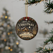 Close-up of a custom coordinates Christmas ornament displaying a winter village scene and personalized location.