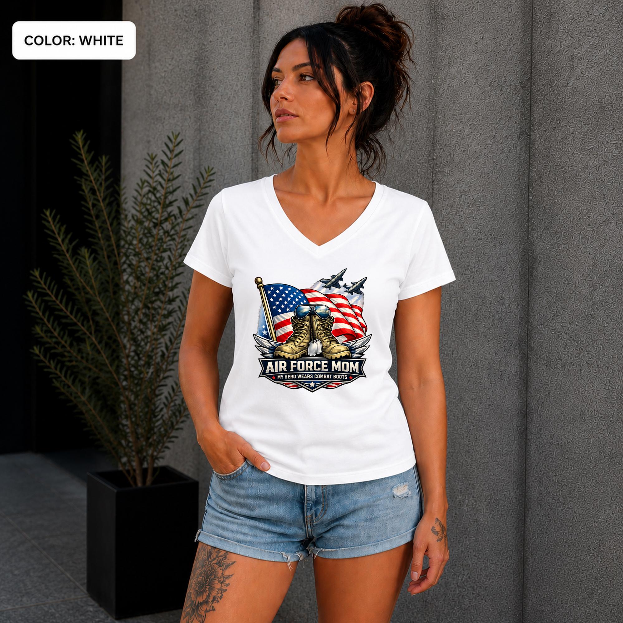 Woman wearing a white Air Force Mom V-neck shirt featuring combat boots and American flag.