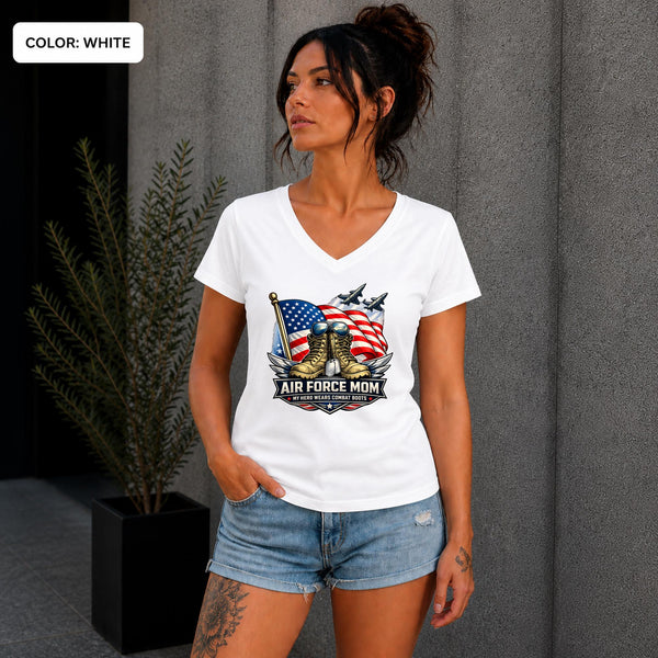 Woman wearing a white Air Force Mom V-neck shirt featuring combat boots and American flag.