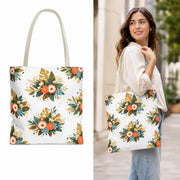 Reusable flower tote styled beside sunglasses, notebook, pen, and dried blossoms.