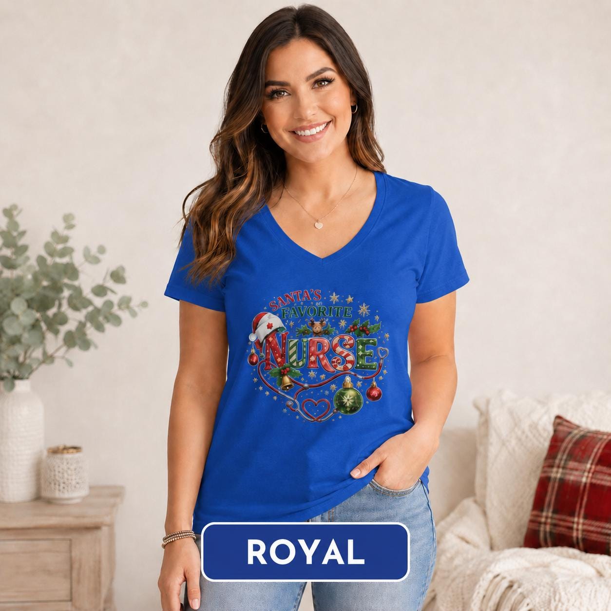 Festive nursing top styled with jeans in a cozy holiday home setting.