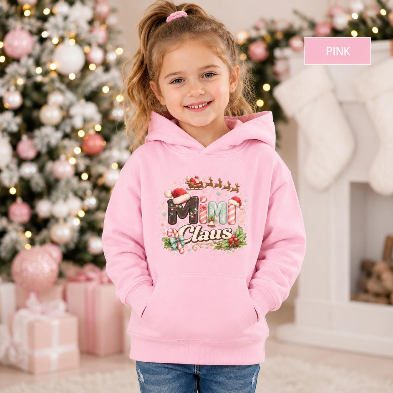 Kids Christmas pullover featuring Santa hats, candy-cane lettering, holly, bells, and stars.
