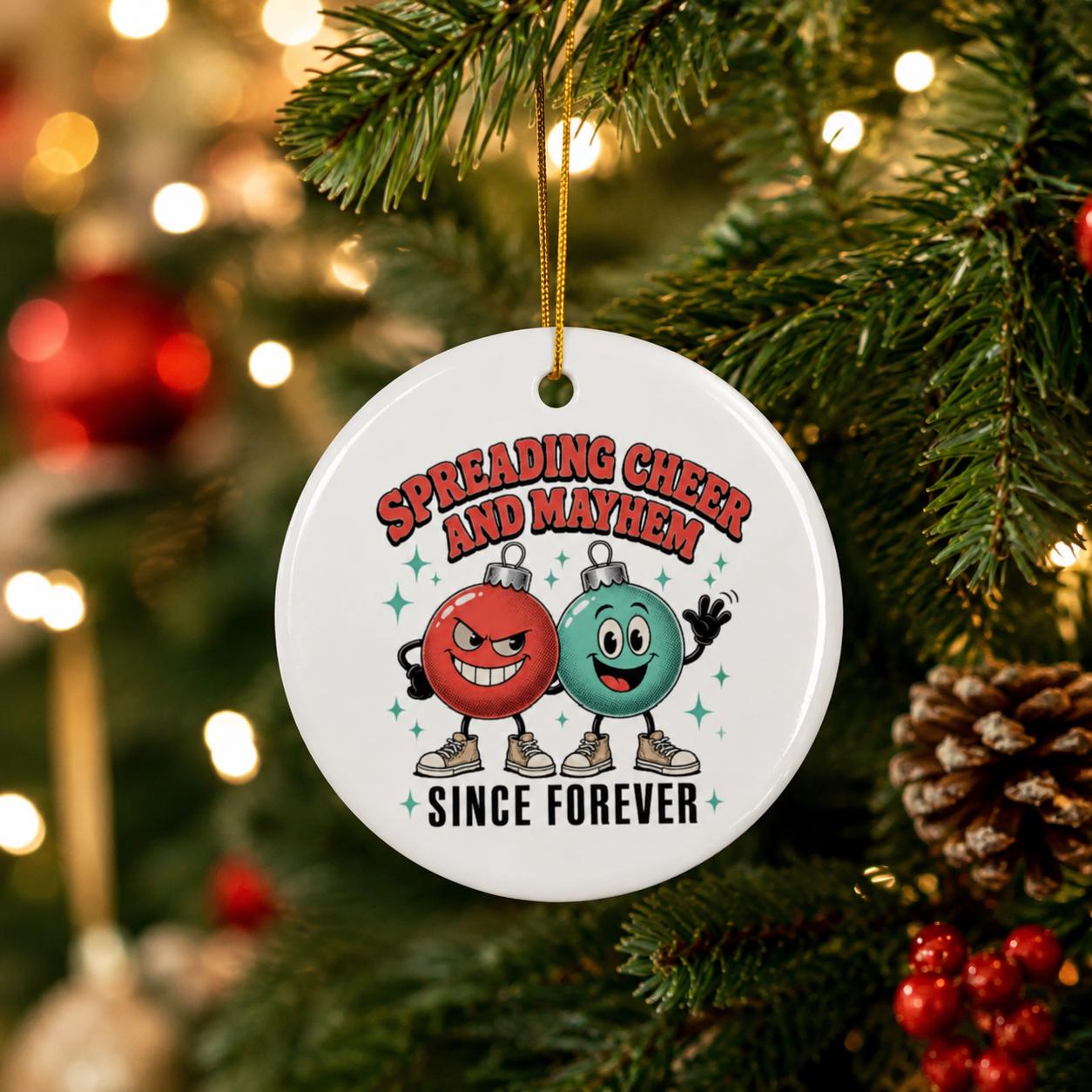 Round friendship Christmas ornament featuring red and teal cartoon bauble characters.