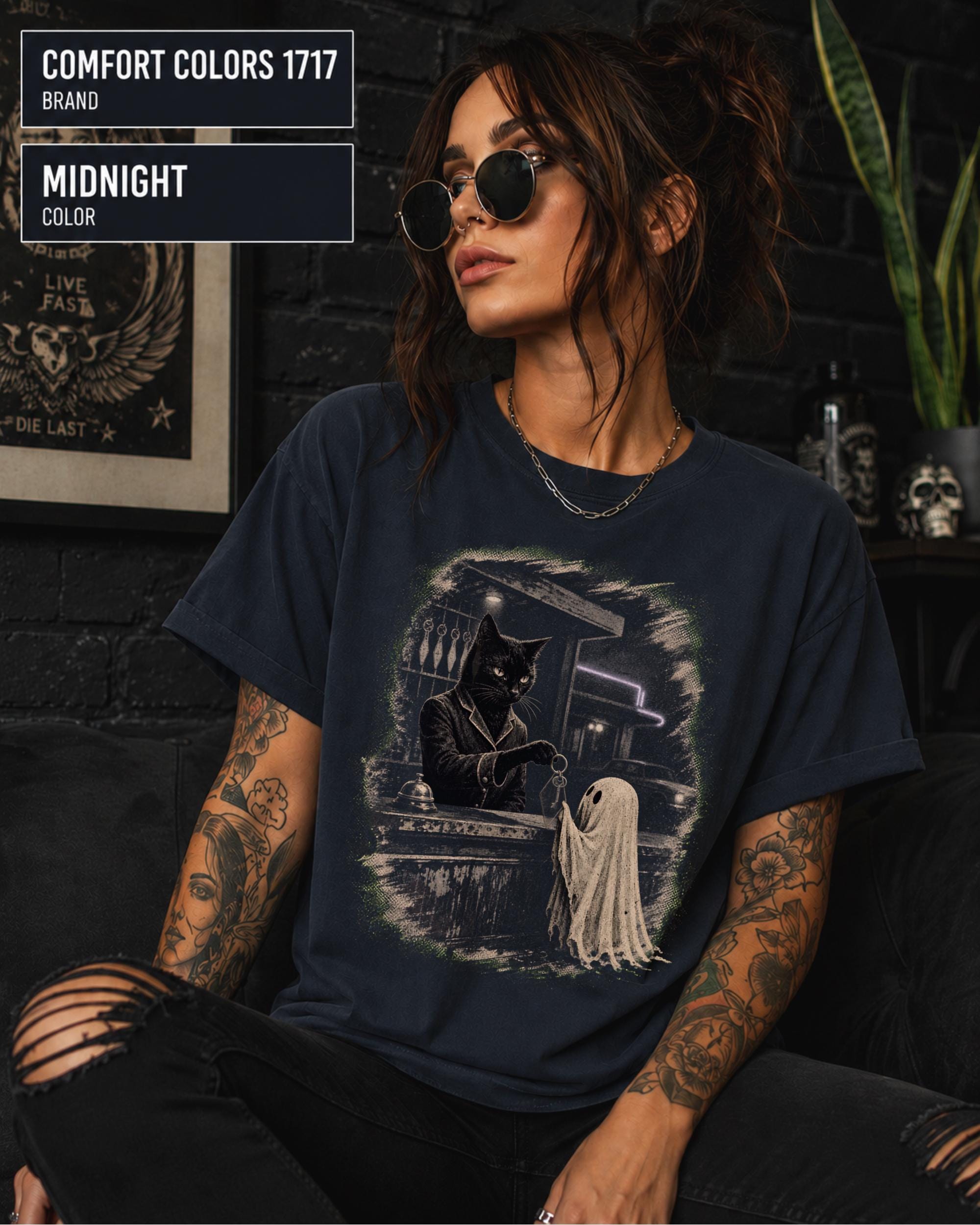 Spooky season shirt for cat lovers, ghost fans, and vintage horror enthusiasts.